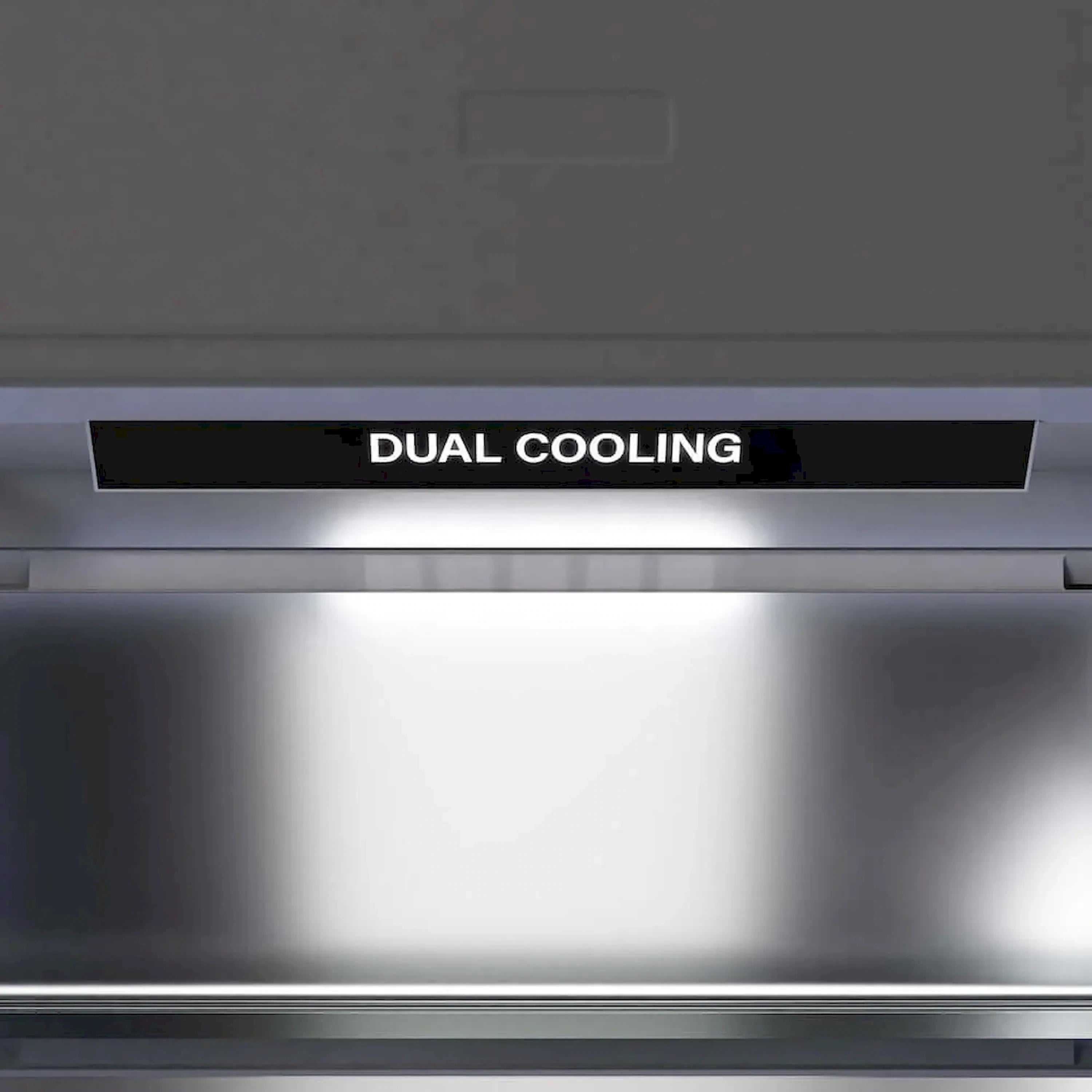 Refrigerator interior vent panel labeled “DUAL COOLING”