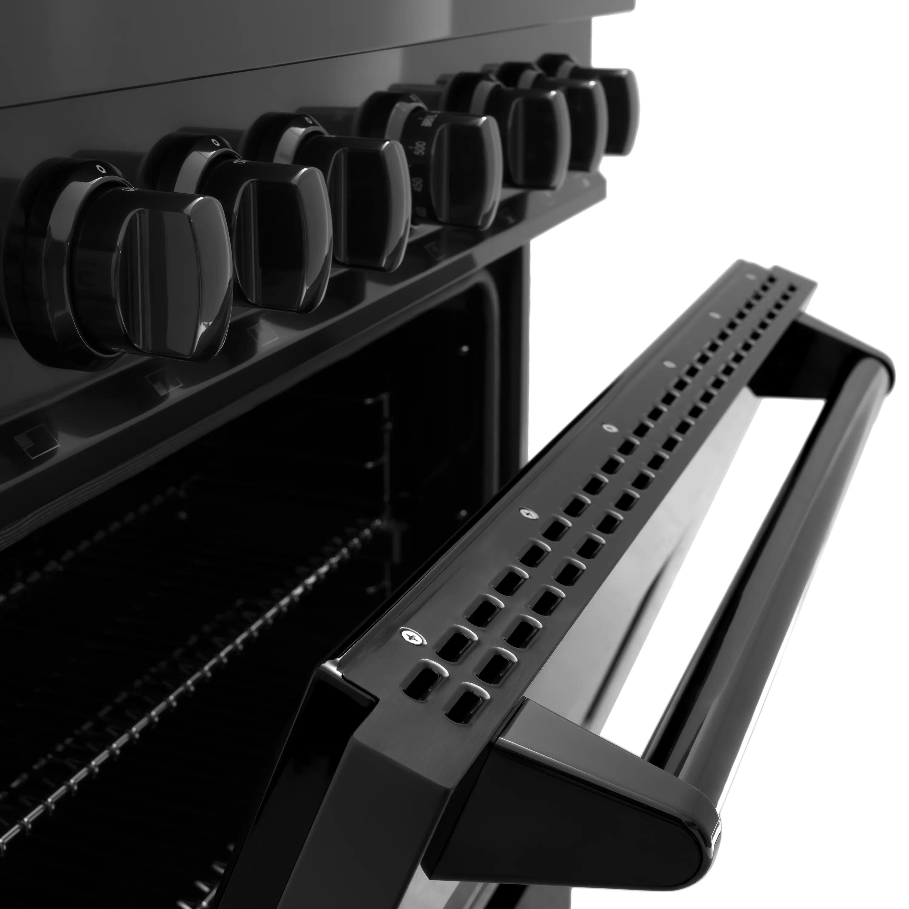 Close-up of black gas range control knobs and side handle near oven door