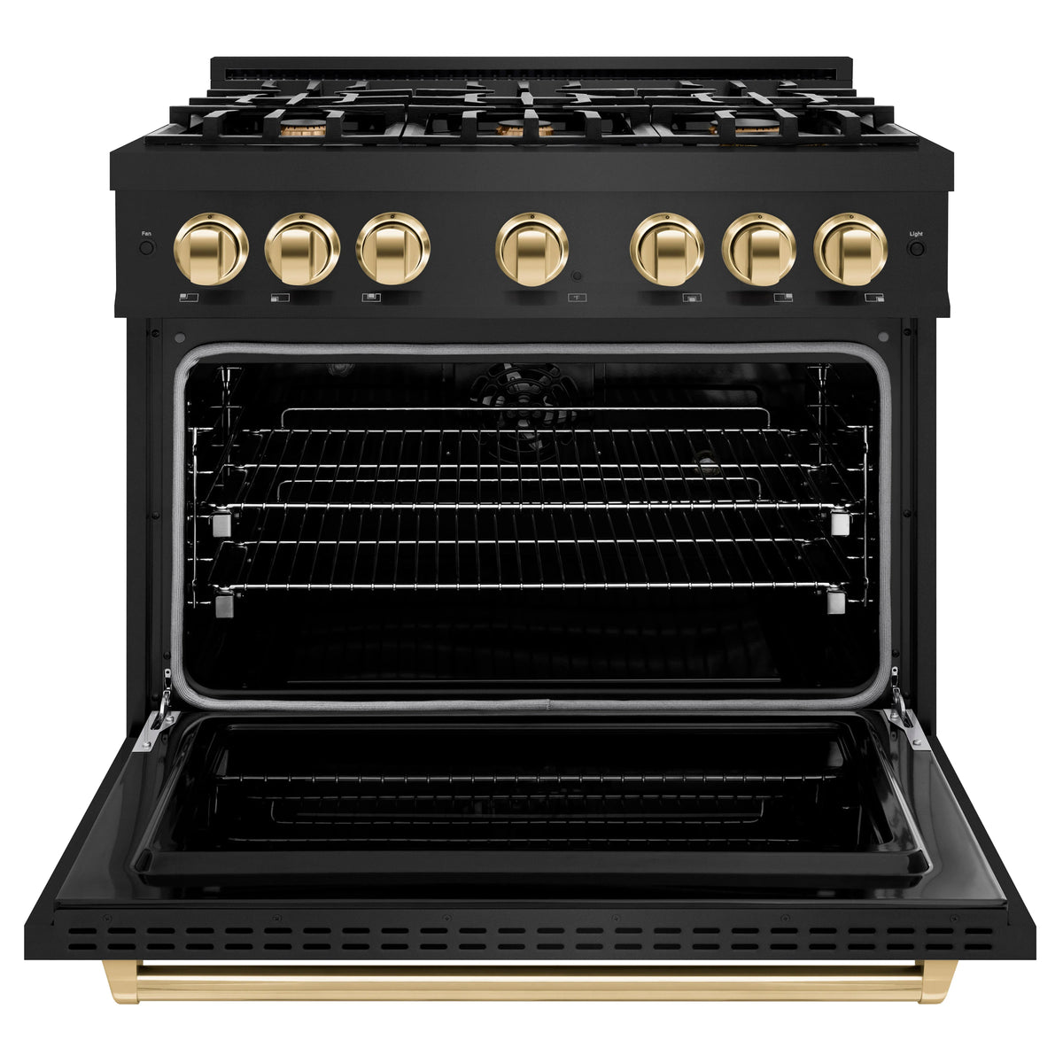 Black dual fuel range with gold knobs and open oven cavity with racks