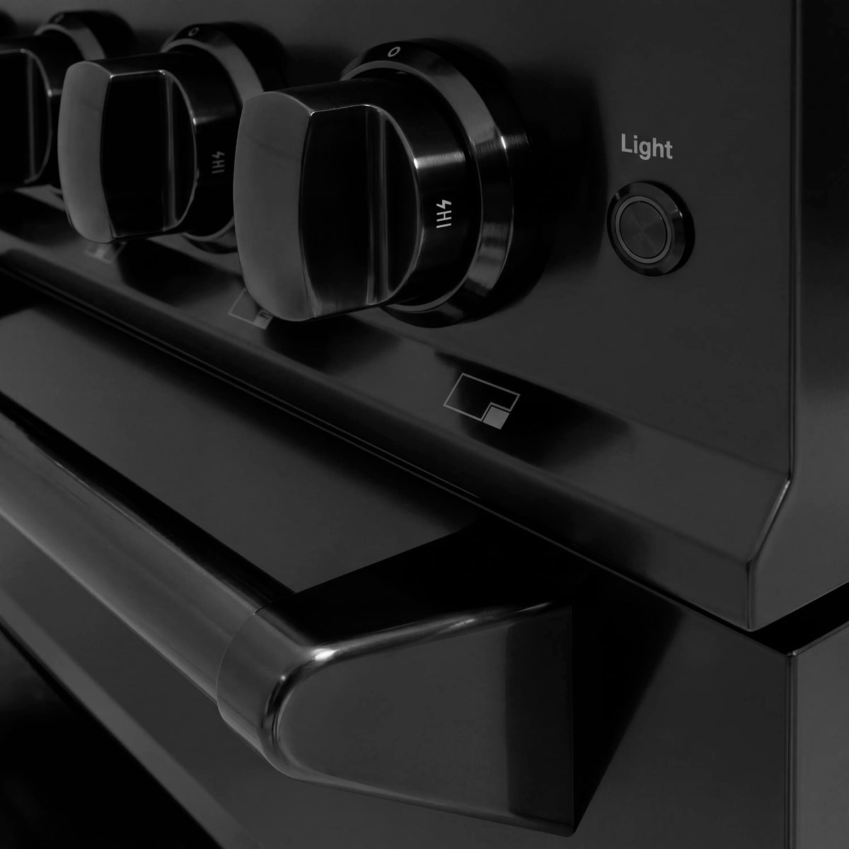 Black stainless control knobs with Light setting on gas range