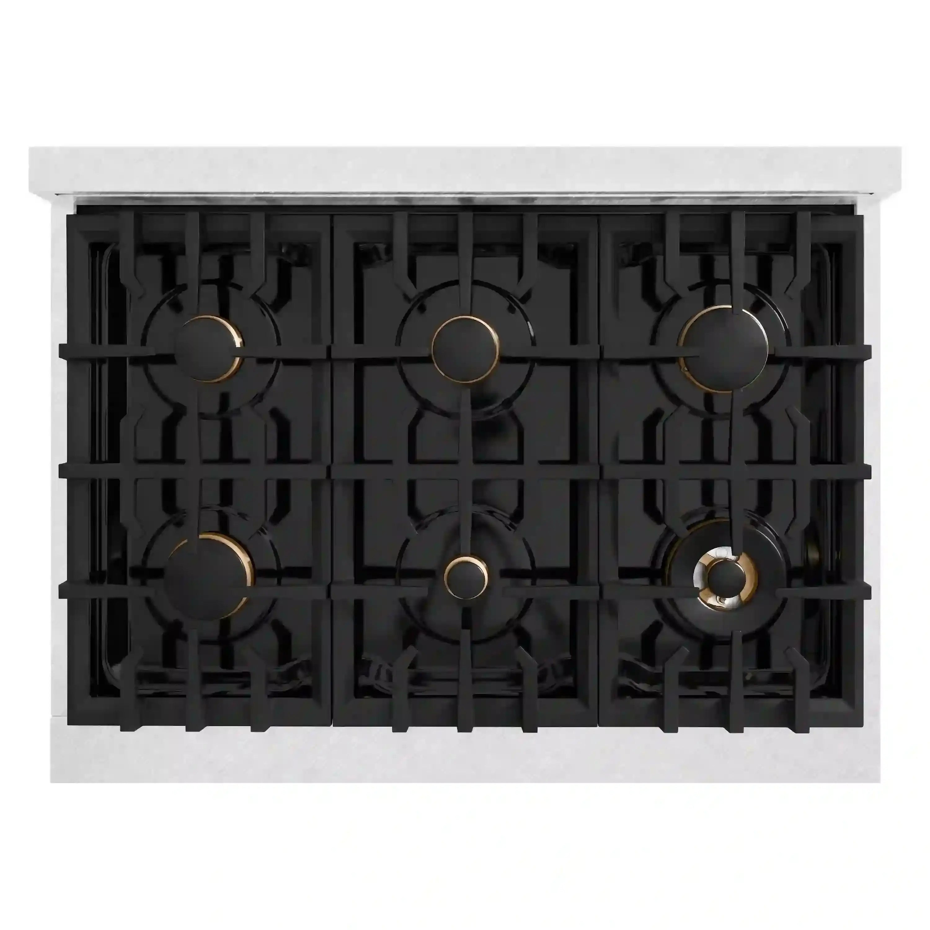 Black cooktop grates with brass burner caps on a stainless steel base