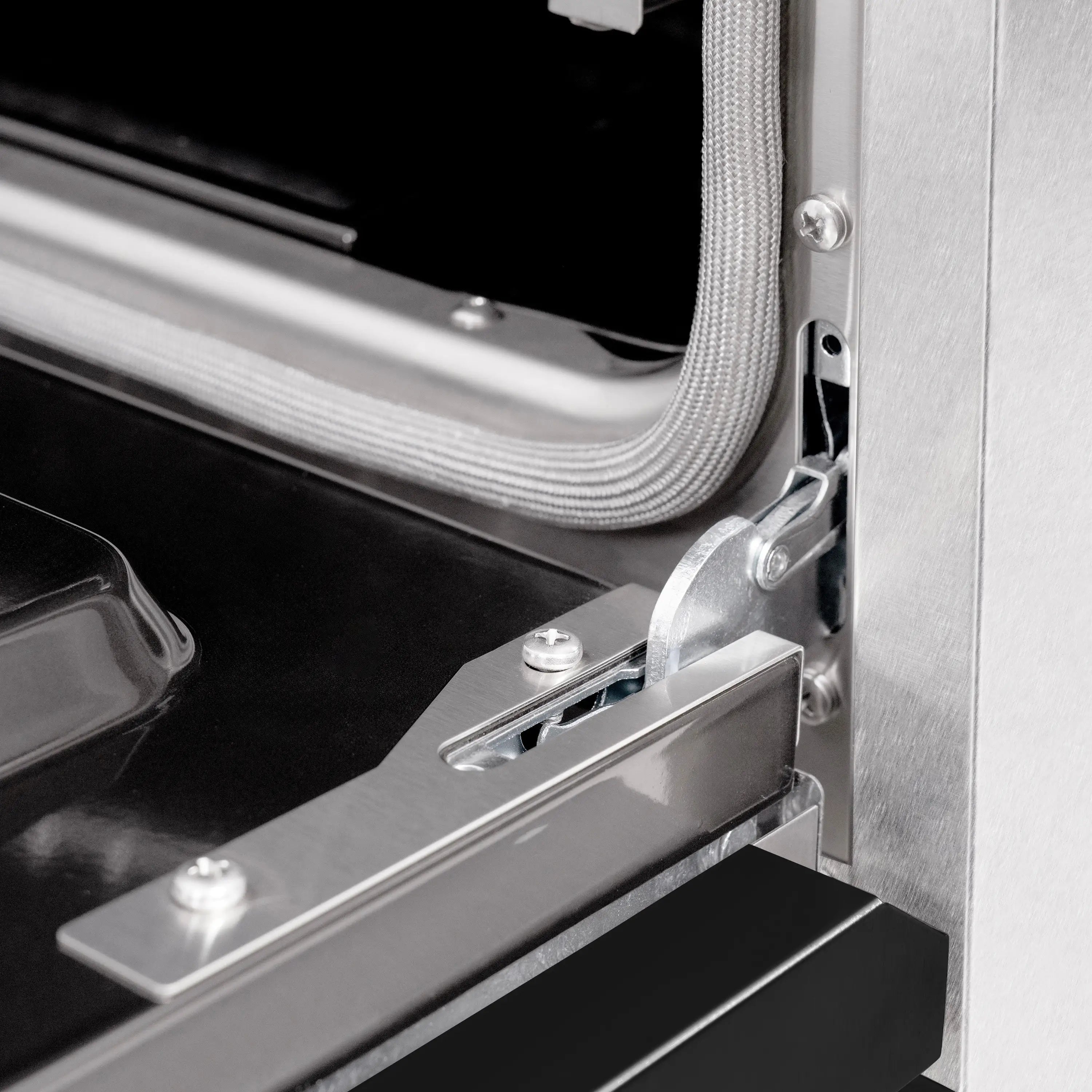 ZLINE gas range oven door hinge and handle latch in brushed metal