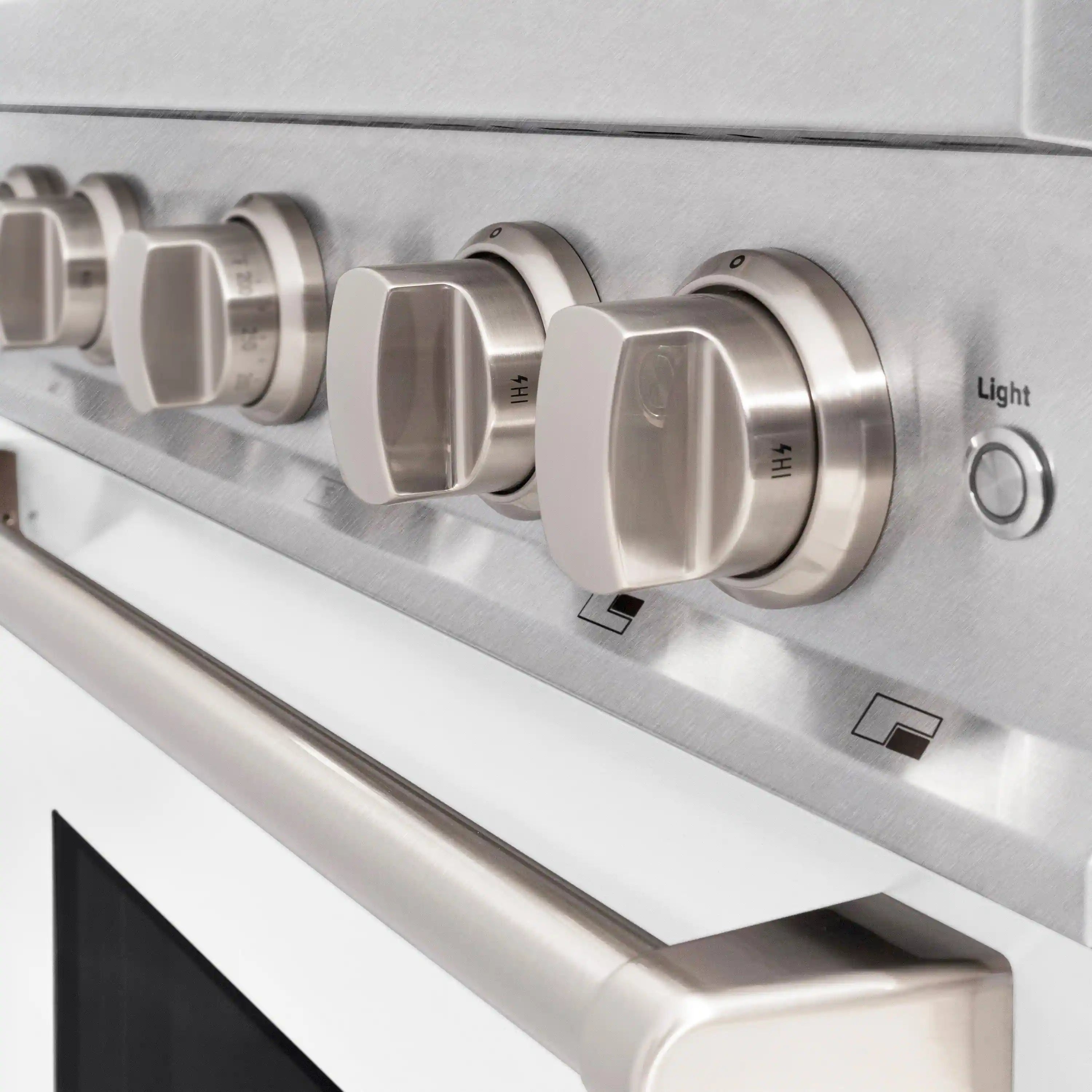 Dual fuel range control knobs on satin stainless with Light control