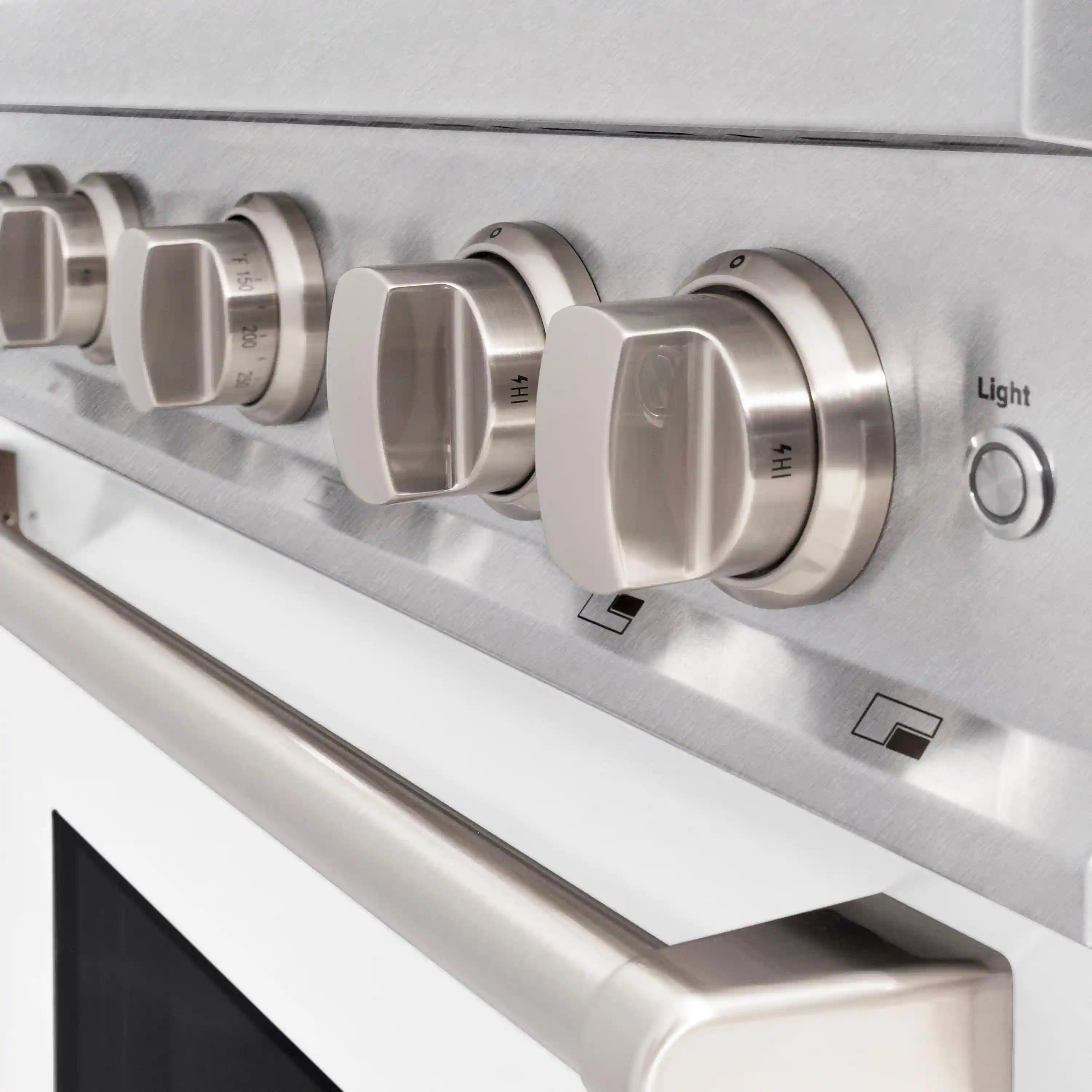 Stainless steel range control knobs with Light button on front panel