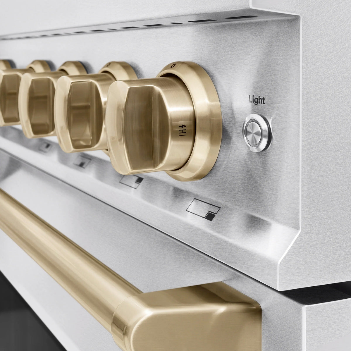 Champagne bronze oven control knobs with light setting indicator on stainless panel