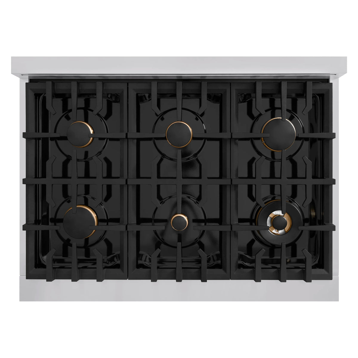 Black gas burner assembly with brass-ring caps under stainless cooktop trim