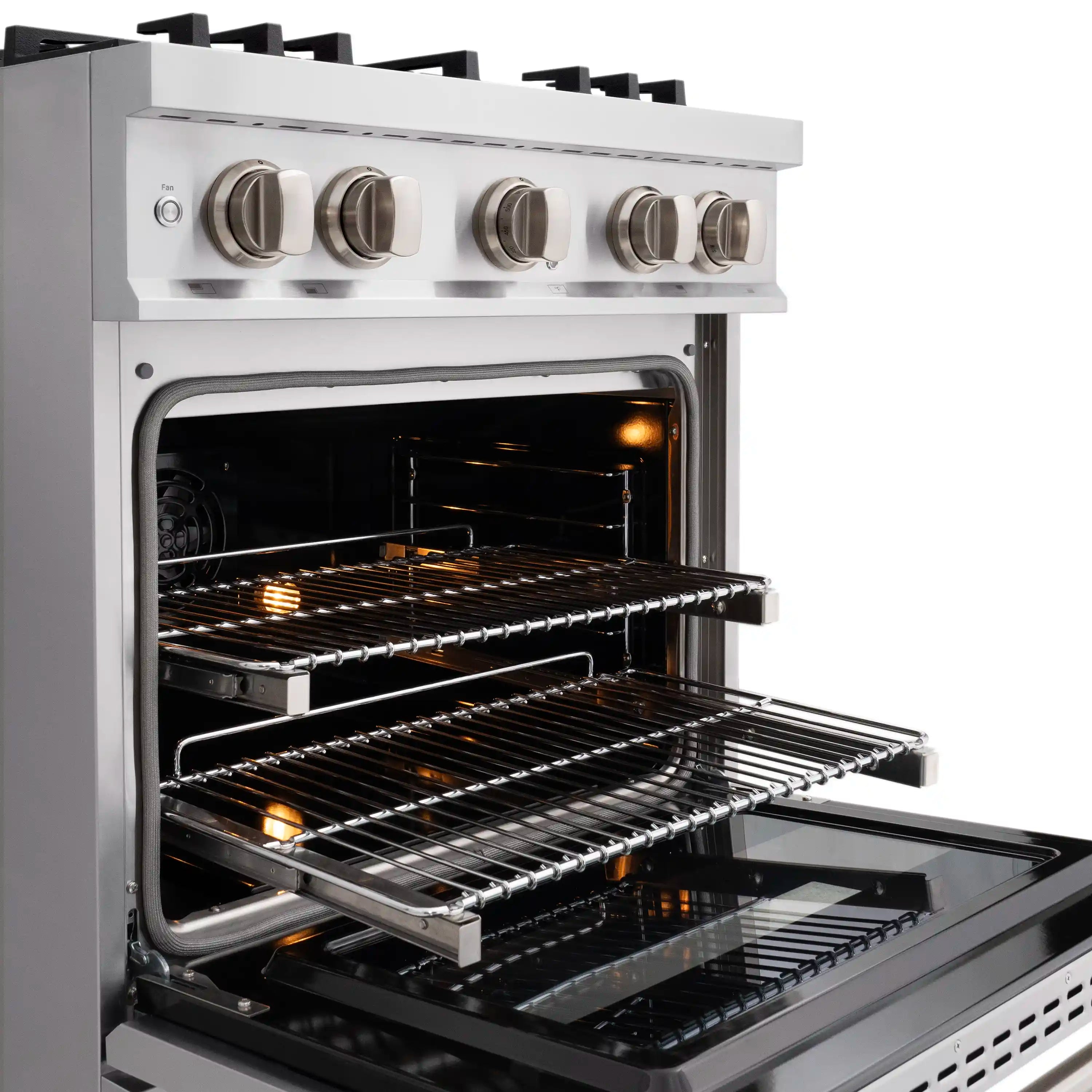 Dual fuel range oven interior with illuminated heating elements and chrome racks