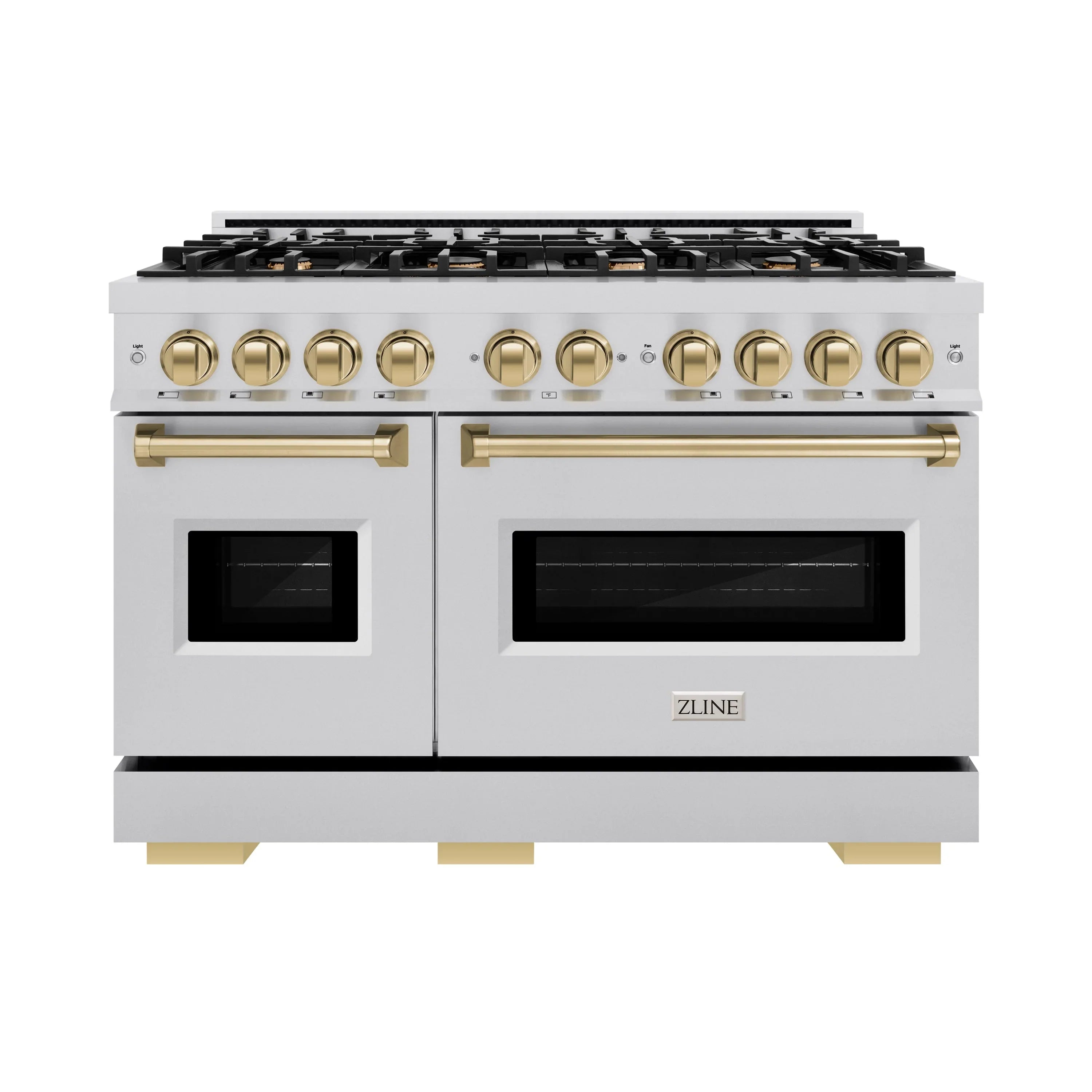 Stainless steel dual fuel range with gold control knobs and two black glass ovens