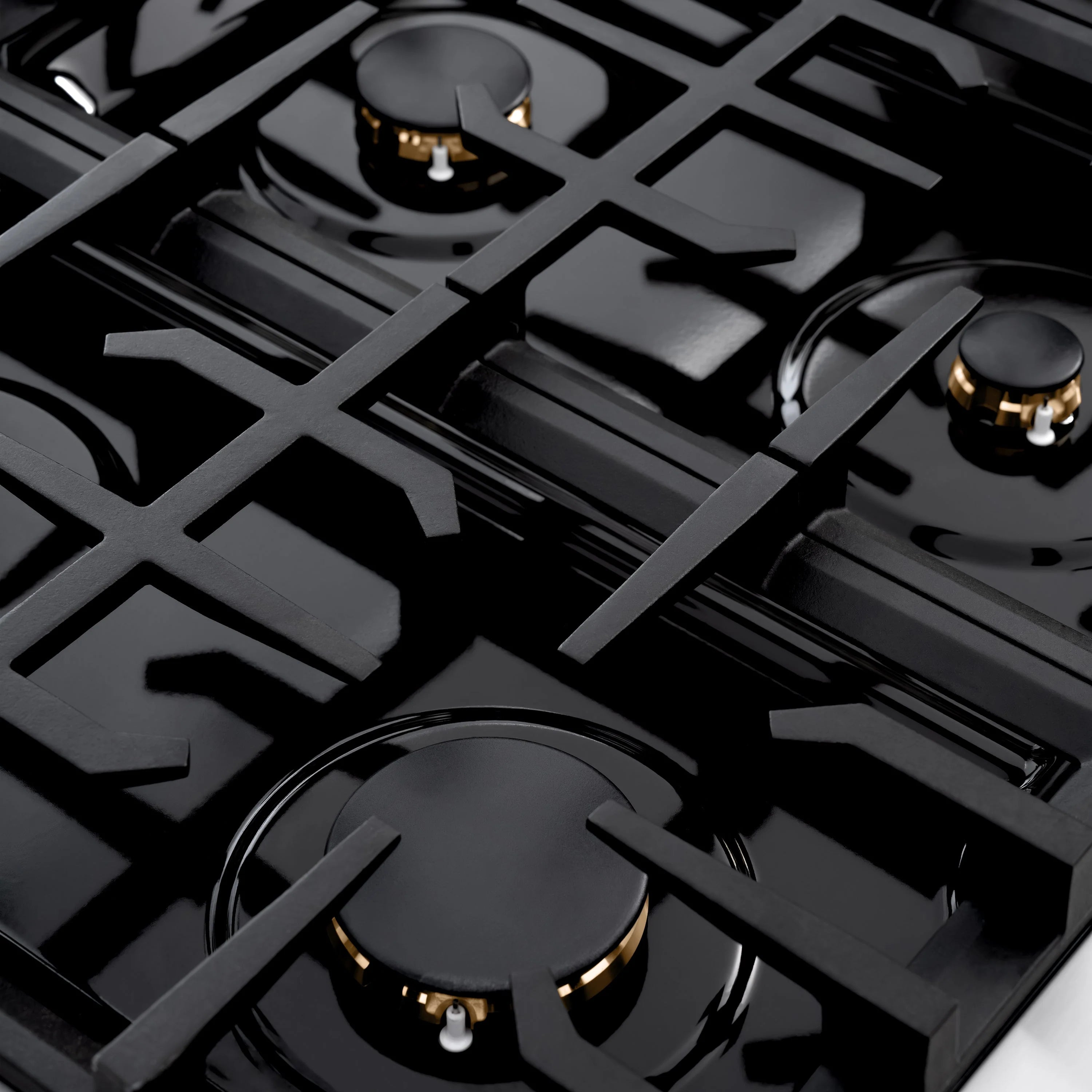 Close-up of black gas burner cap and grates on glossy cooktop surface