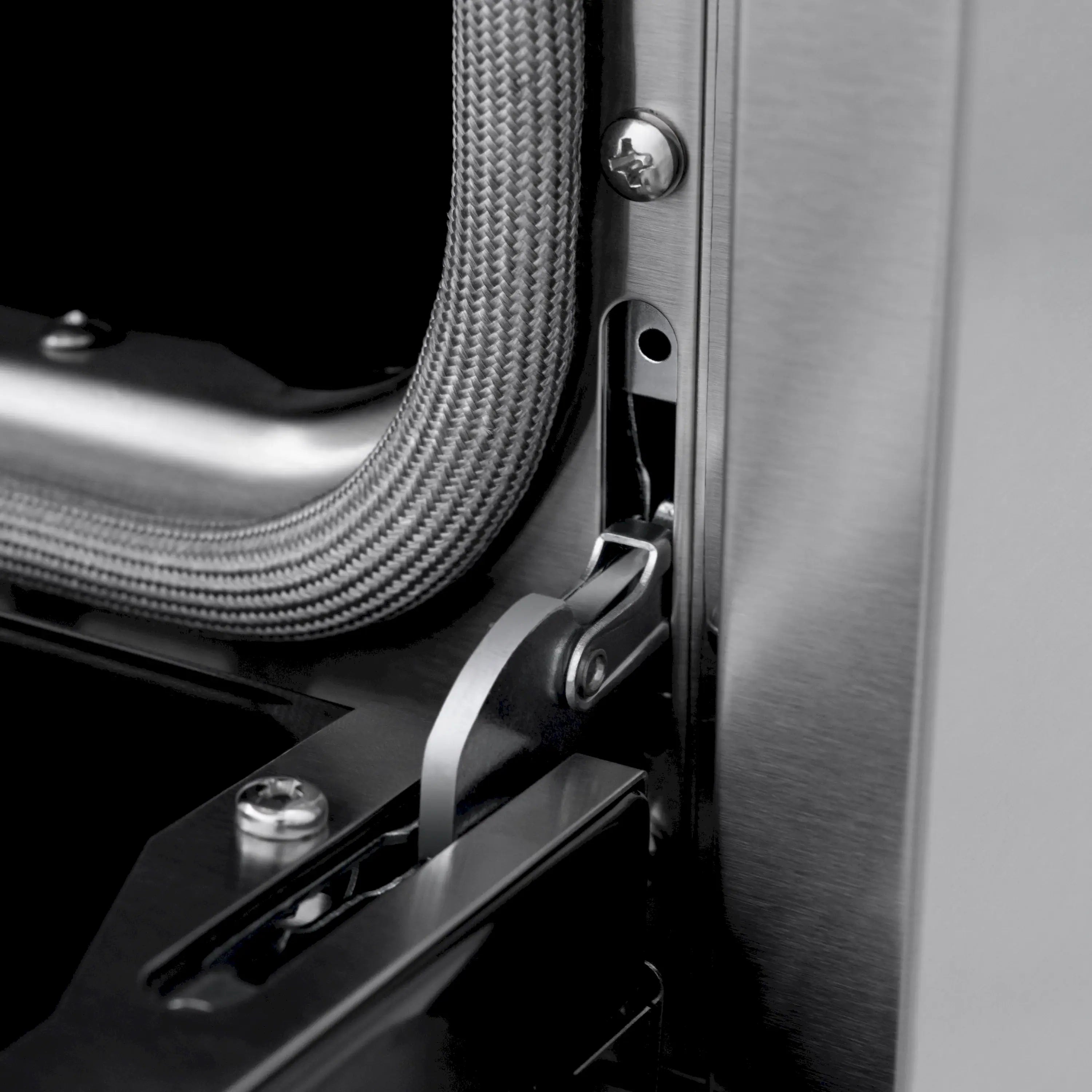 Stainless steel gas range side with flexible gas hose and mounting bracket
