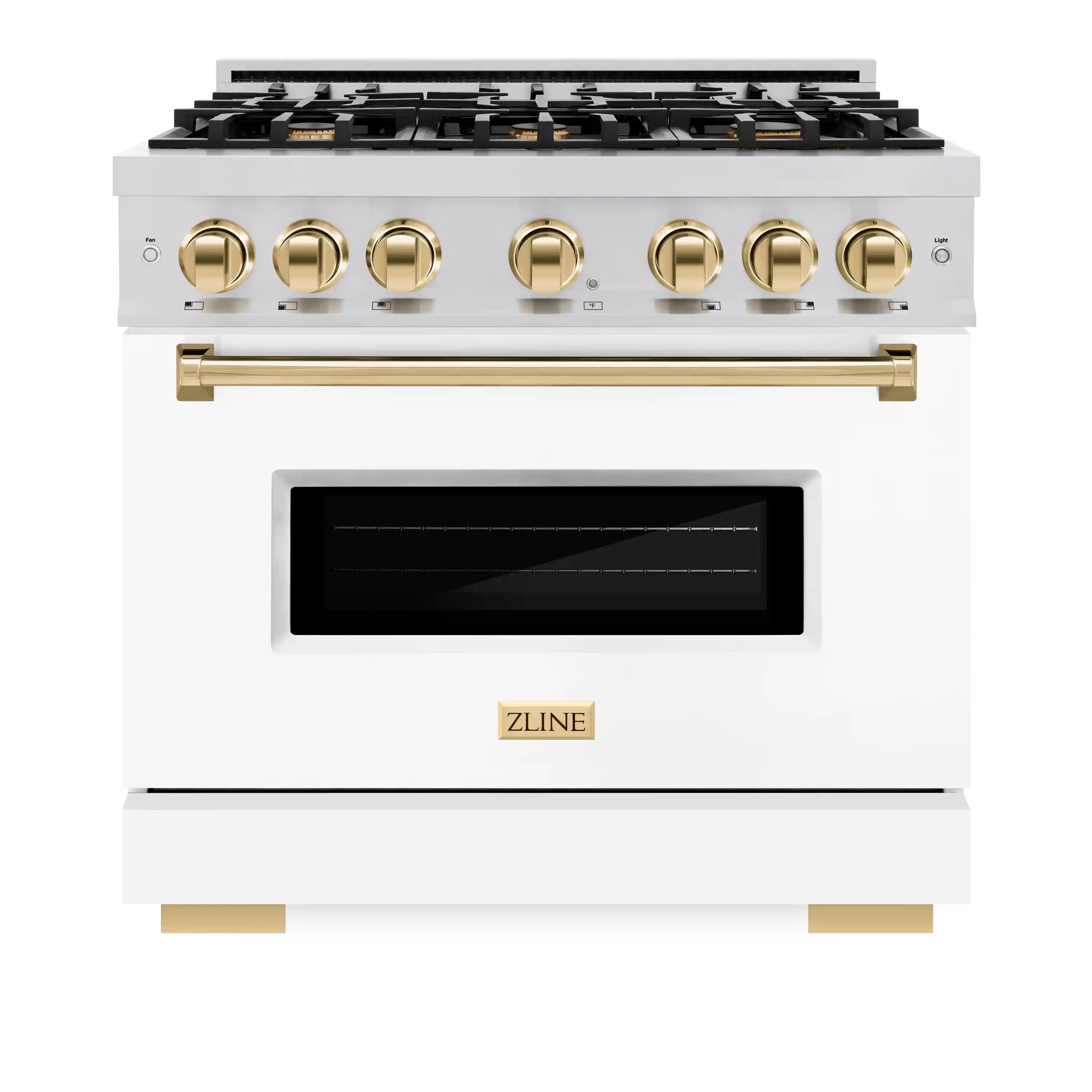 White gas range with black cooktop, gold knobs, and oven window