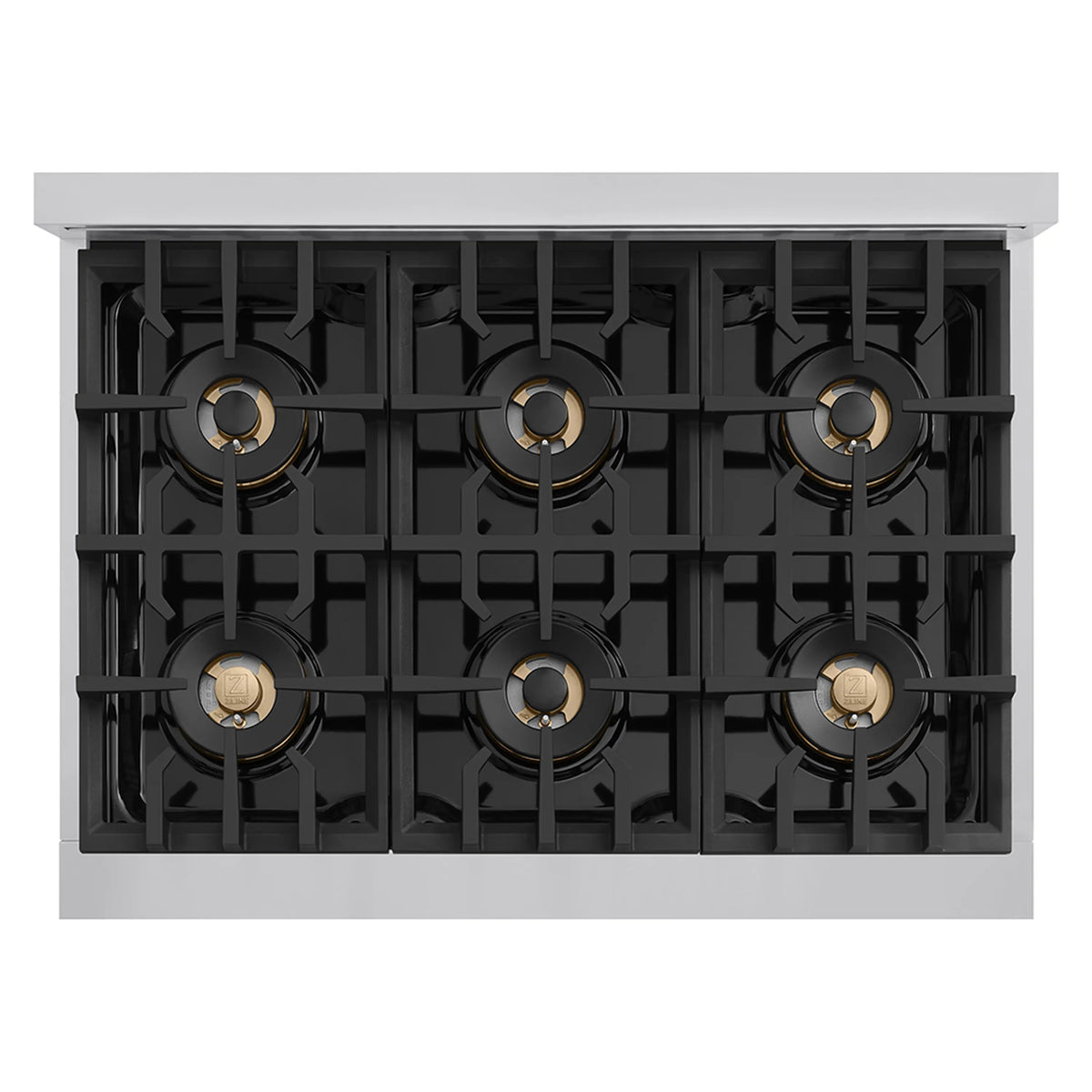 Gas rangetop burner box view with six burner bases and black grates