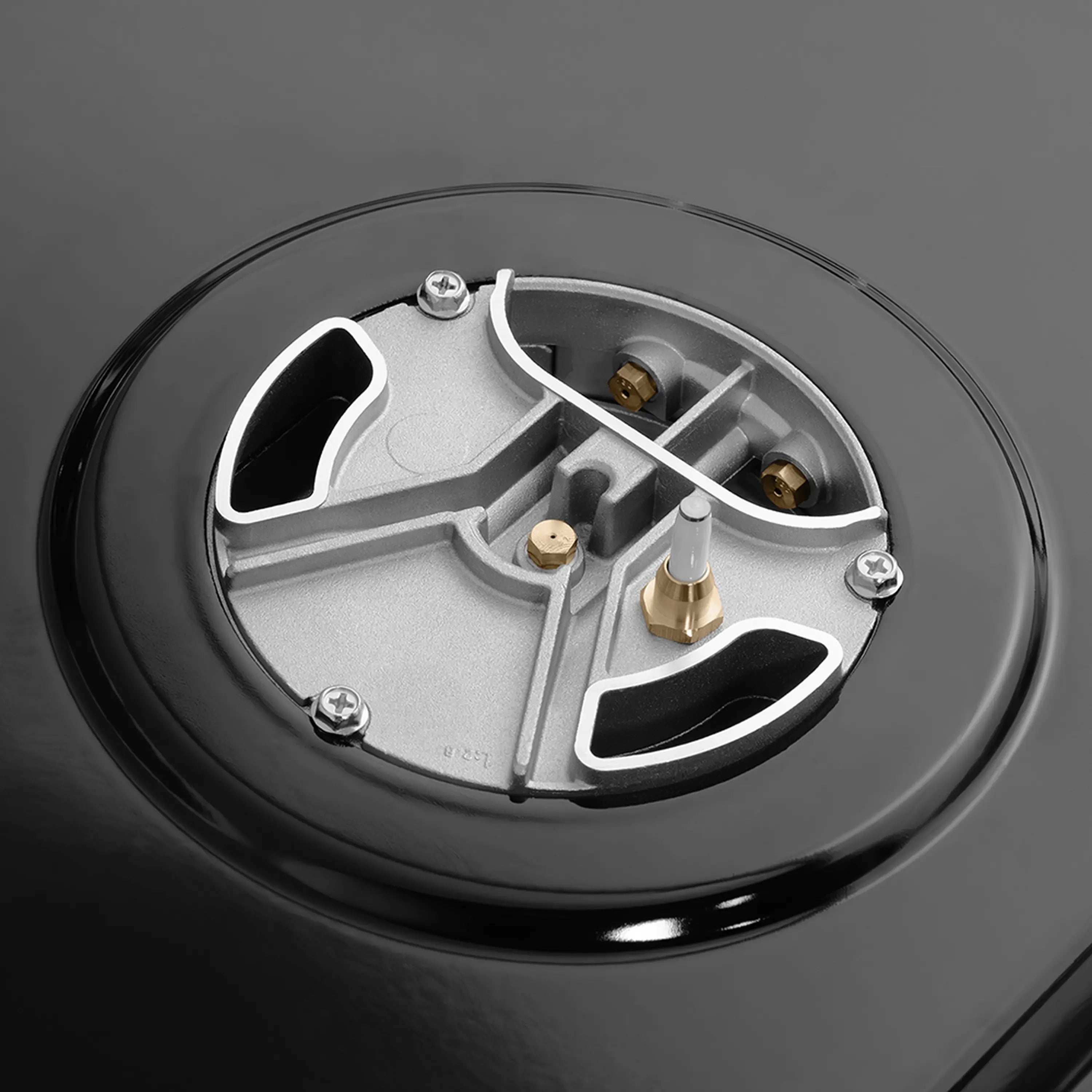 Gas cooktop burner assembly with black enamel cover and brass burner components