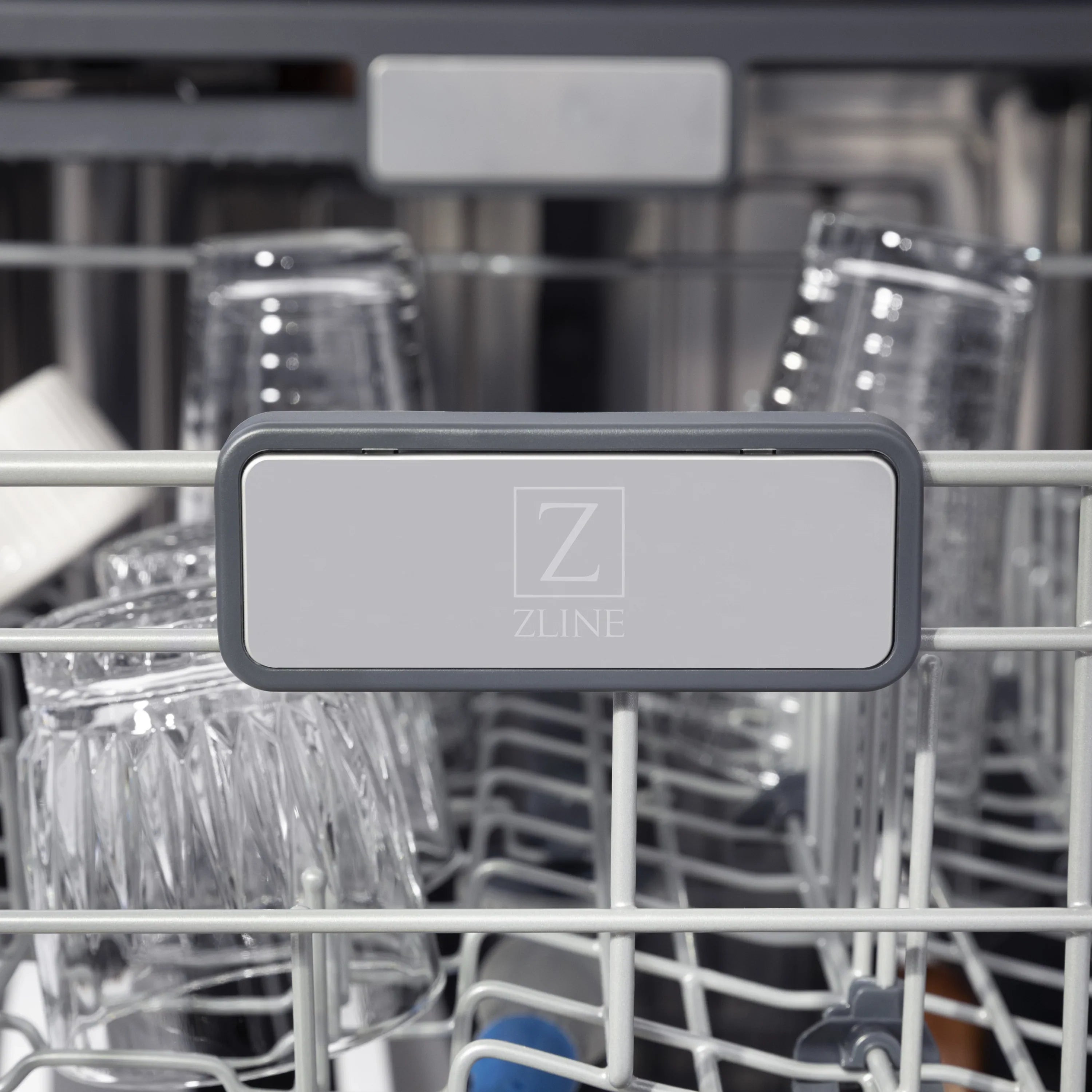 Dishwasher rack with ZLINE label on a gray detergent dispenser panel