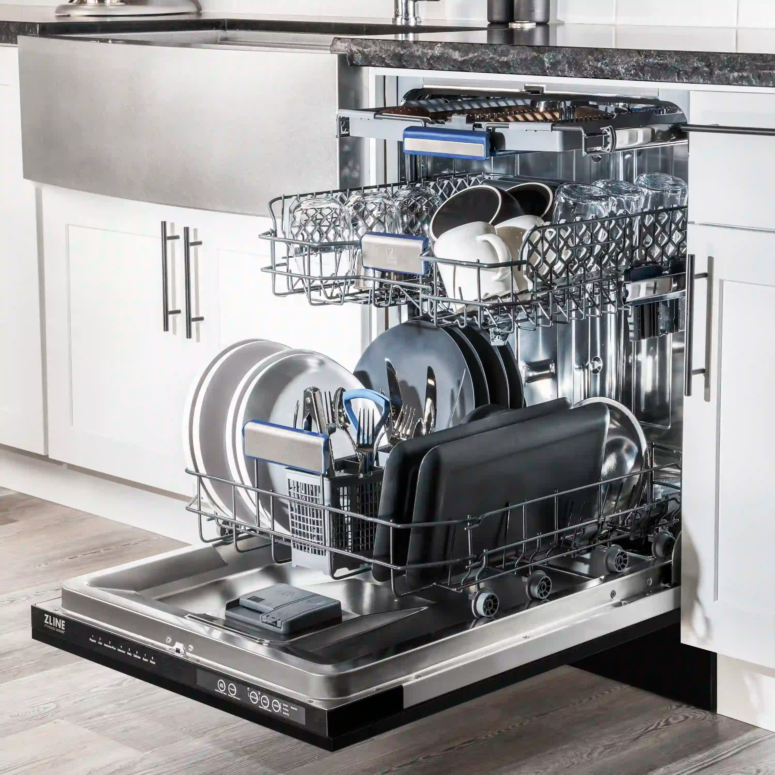 Built-in dishwasher open with racks and dishware inside
