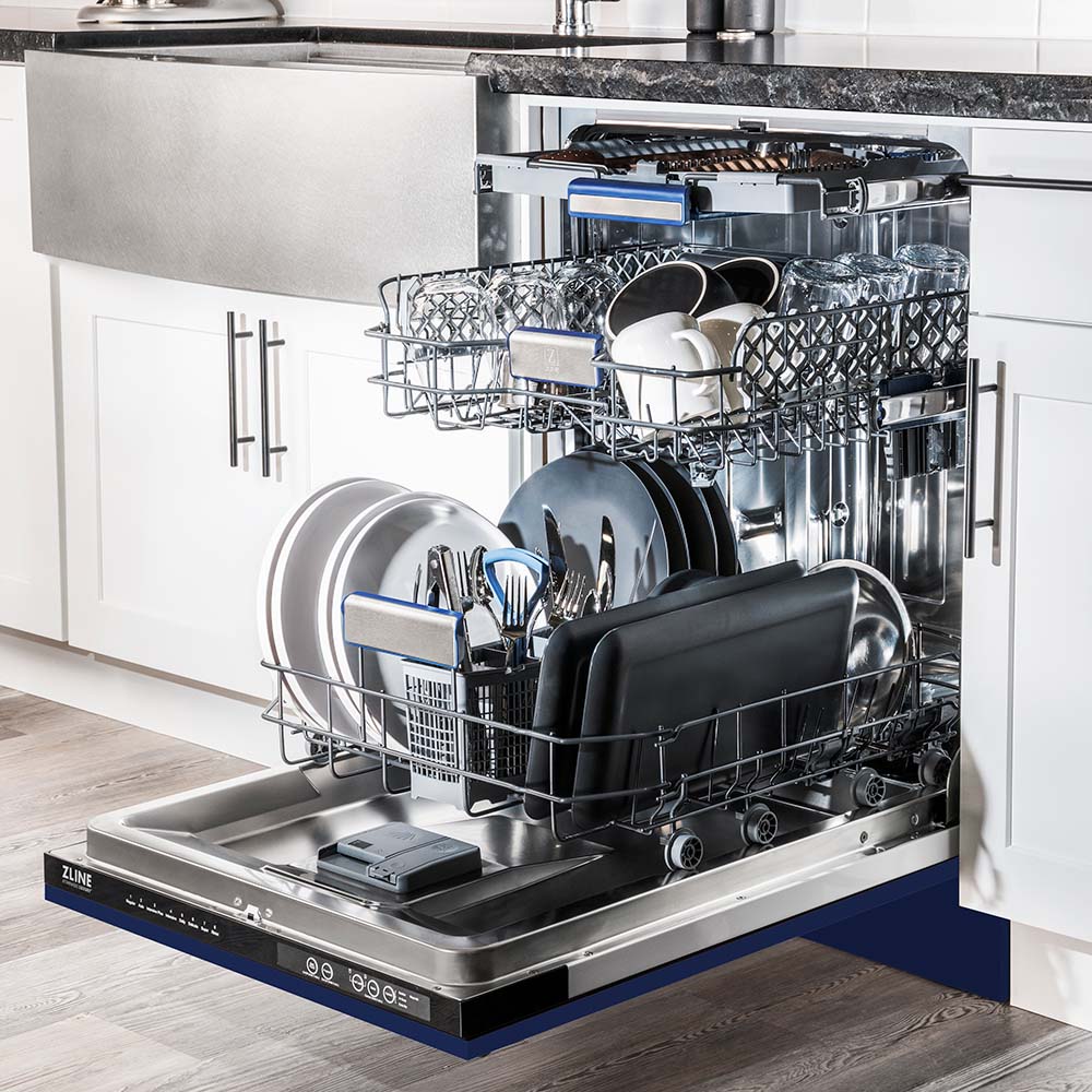 Blue gloss dishwasher open to stainless interior racks and cutlery basket