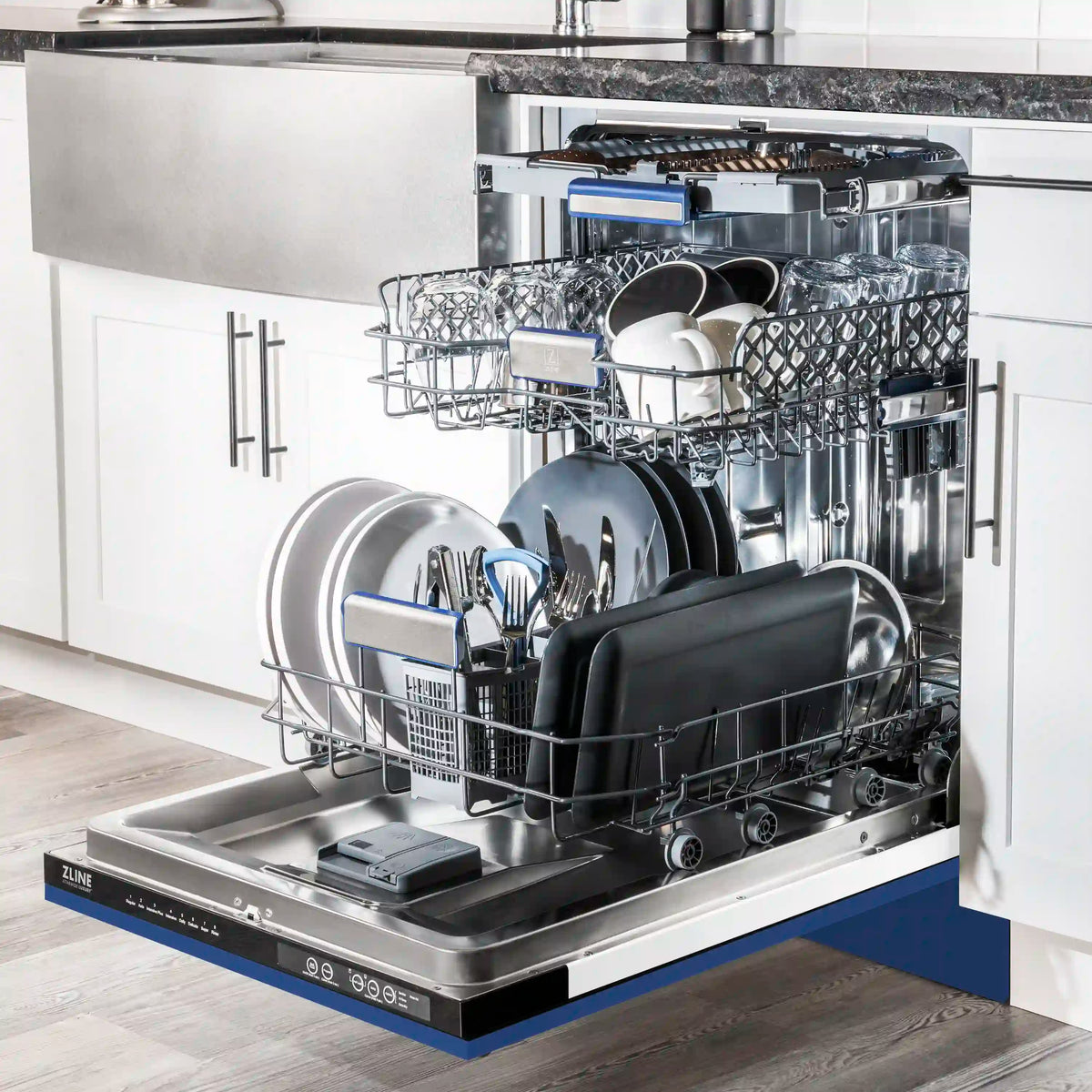 Dishwasher interior with stacked racks and dishware loading on rails
