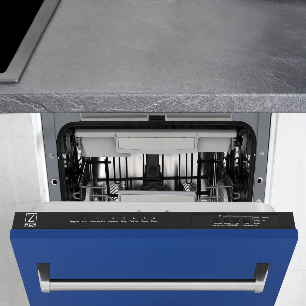 Dishwasher door open with control panel and stainless tub interior visible