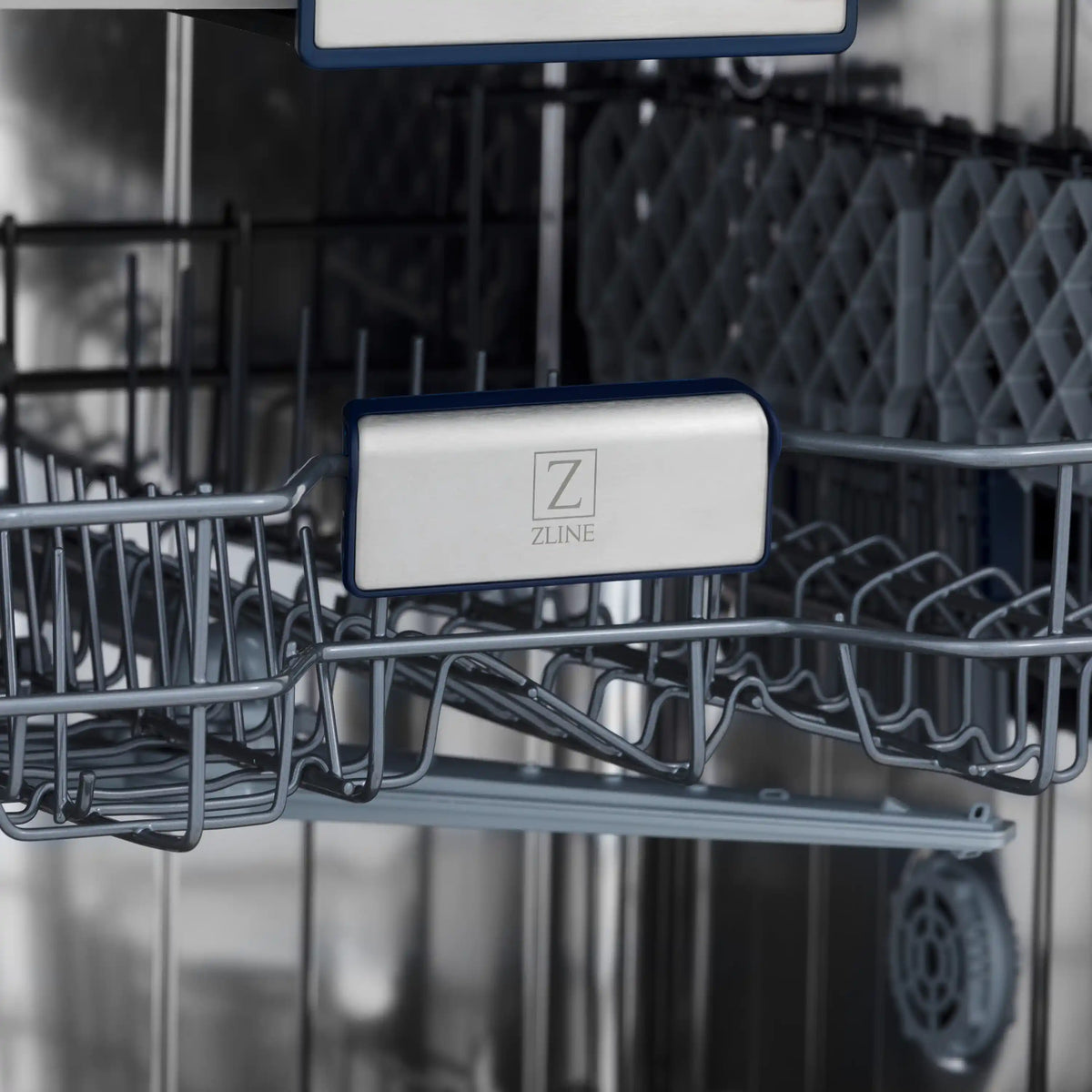 Dishwasher rack with front-mounted control label on grey wire rails