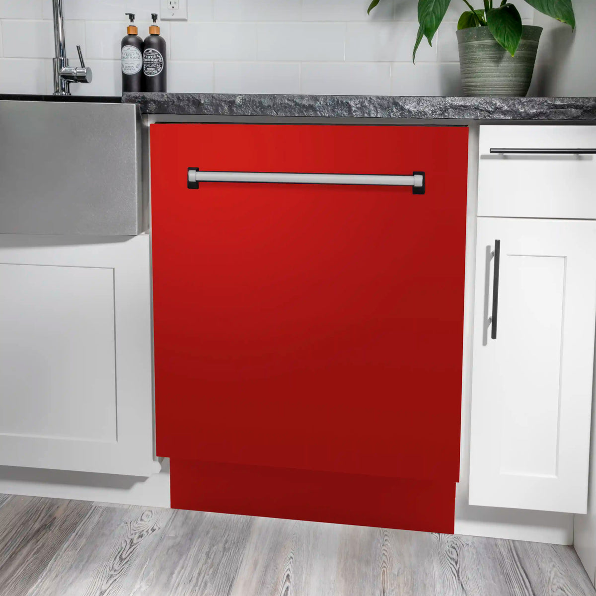 Red matte dishwasher with front panel and top handle, built-in under counter