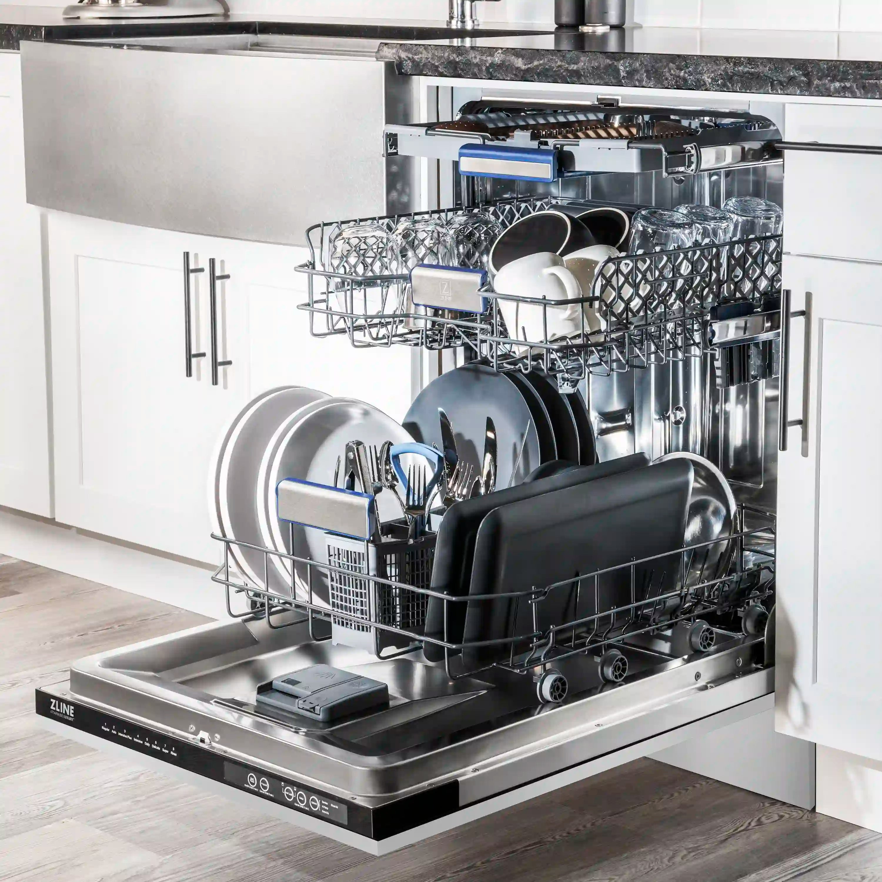 Built-in dishwasher interior with loaded racks and stainless spray system