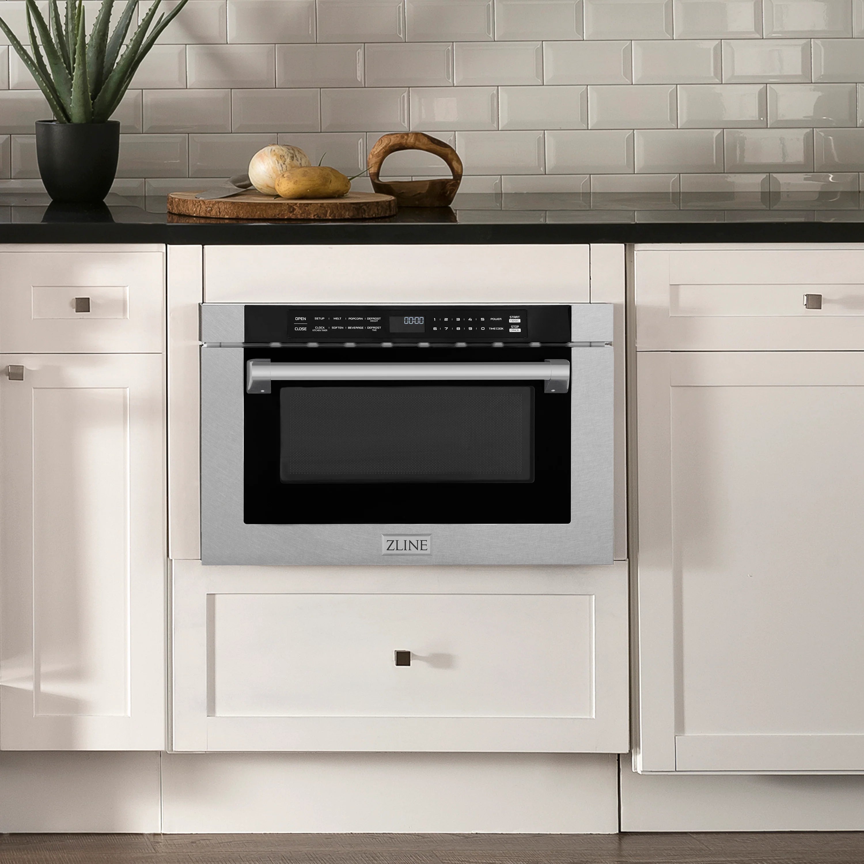 Built-in ZLINE microwave drawer with satin stainless trim and dark viewing window