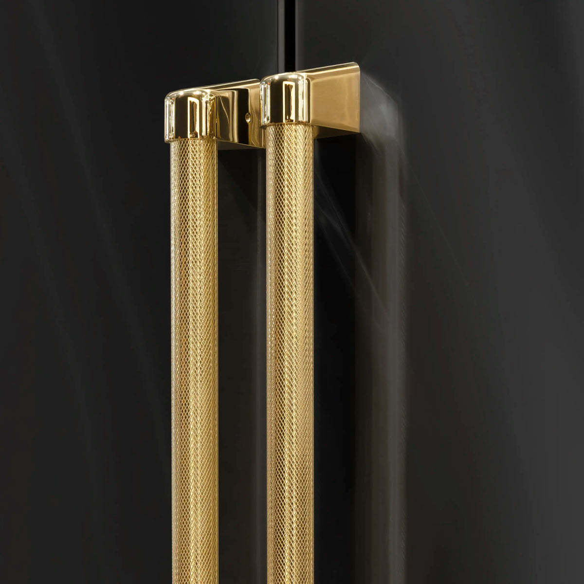 Pair of gold helix handles on a French door refrigerator