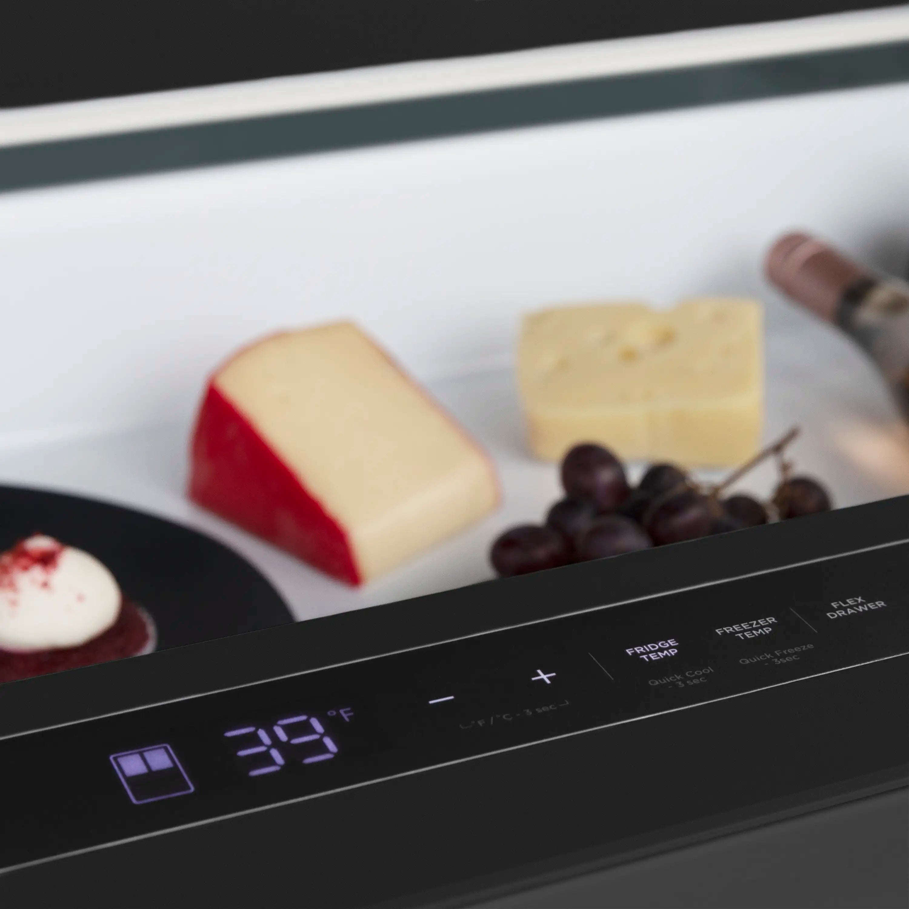 Black stainless steel refrigerator control panel with digital temperature display