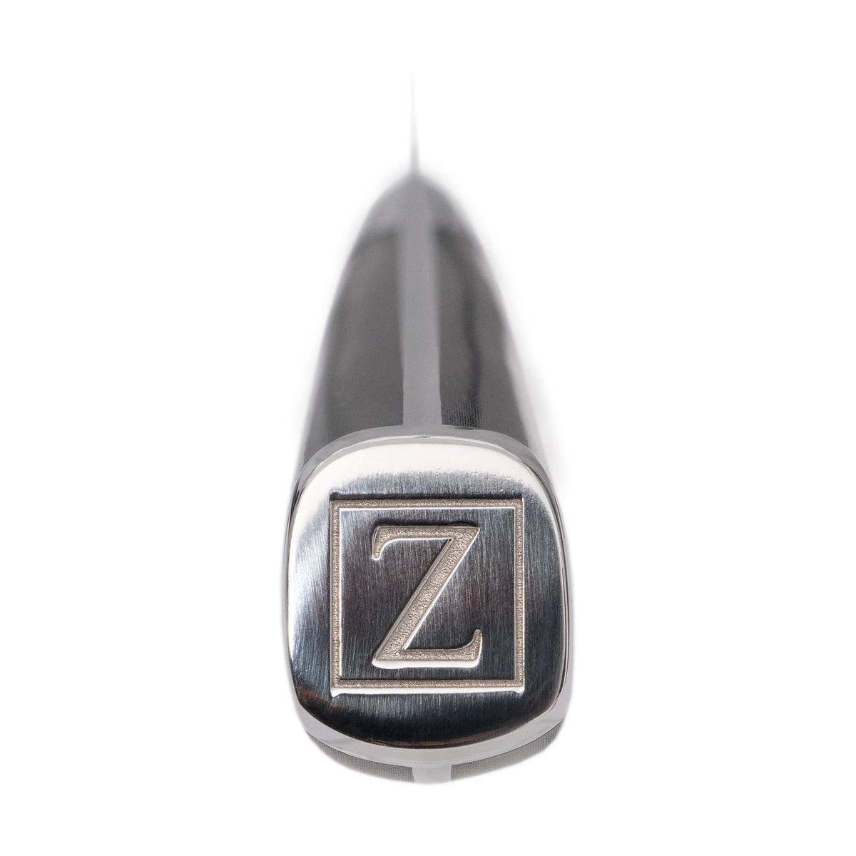 Stainless steak knife handle end with ZLINE logo plate on black handle