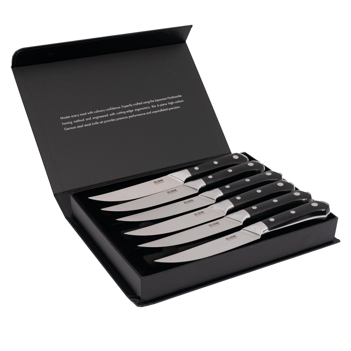 6 steak knives in open black box, black handles with white dots and silver blades
