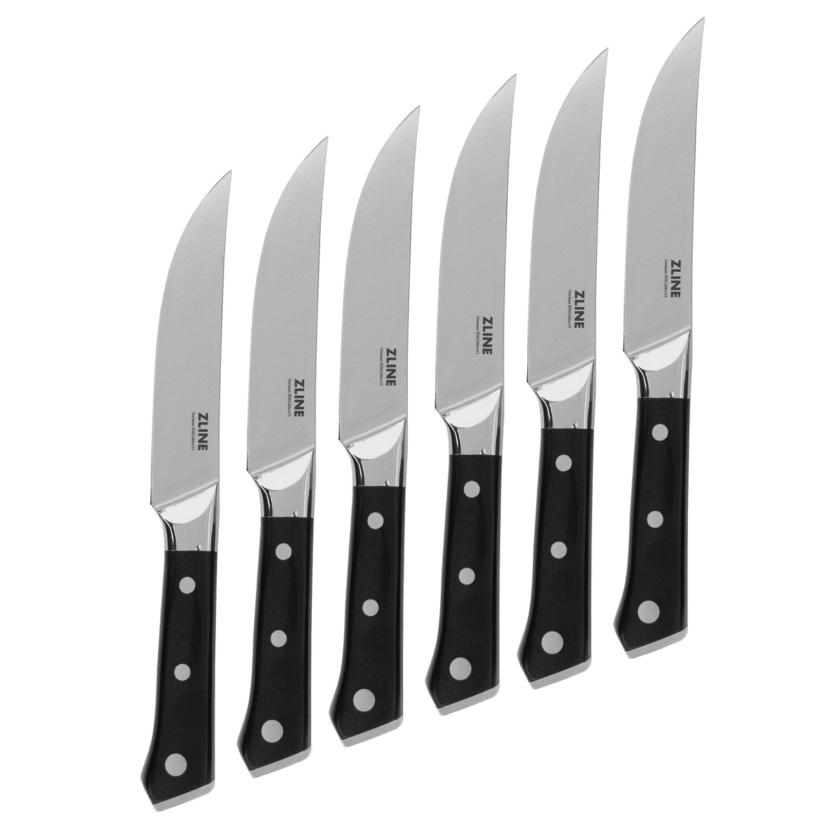Assorted steak knives: six stainless blades with black handles and round white dots