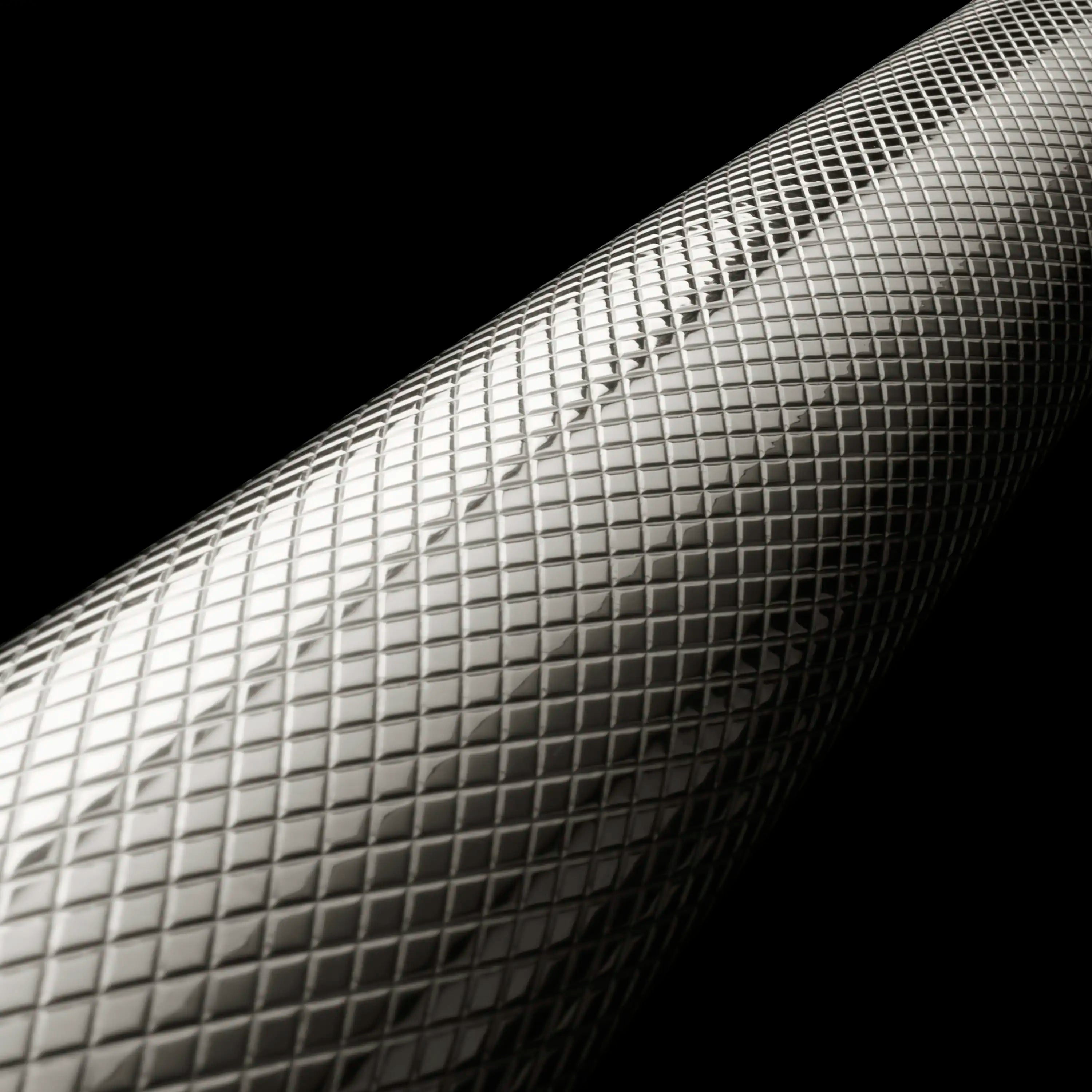 Silver mesh finish tube with diamond pattern texture