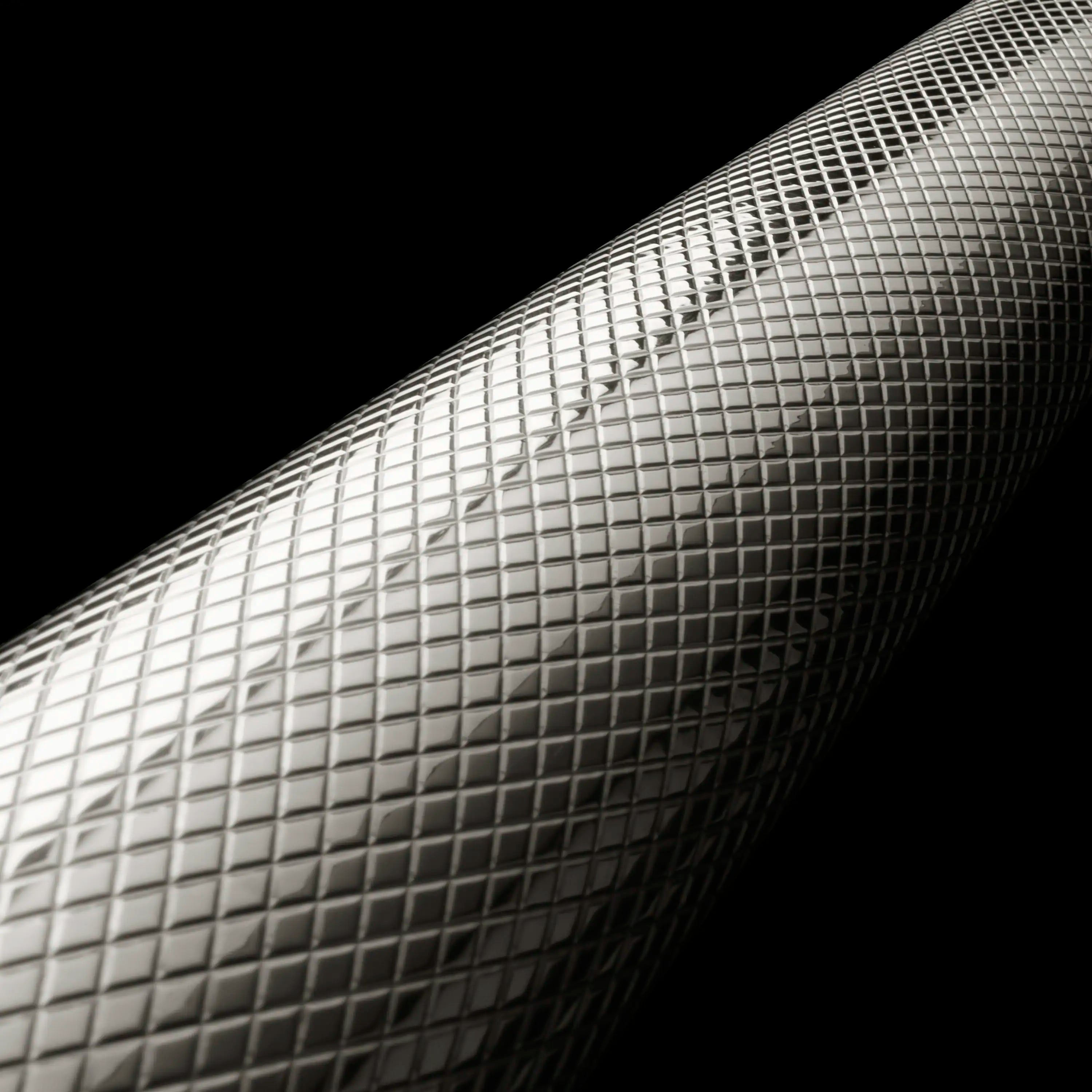 Close-up of stainless steel mesh finish with a textured grid pattern