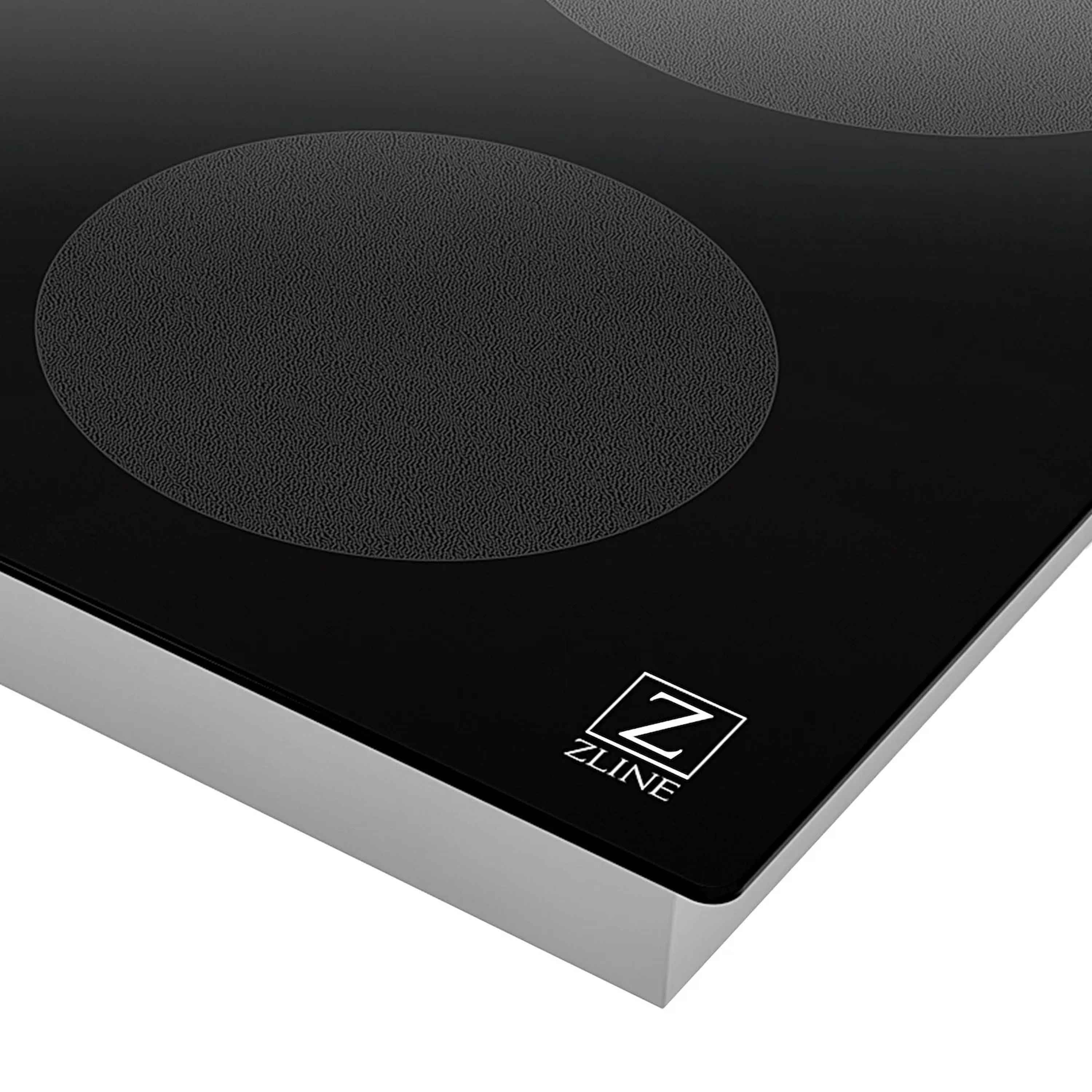 ZLINE induction cooktop with black glass surface and round burner zone at top edge
