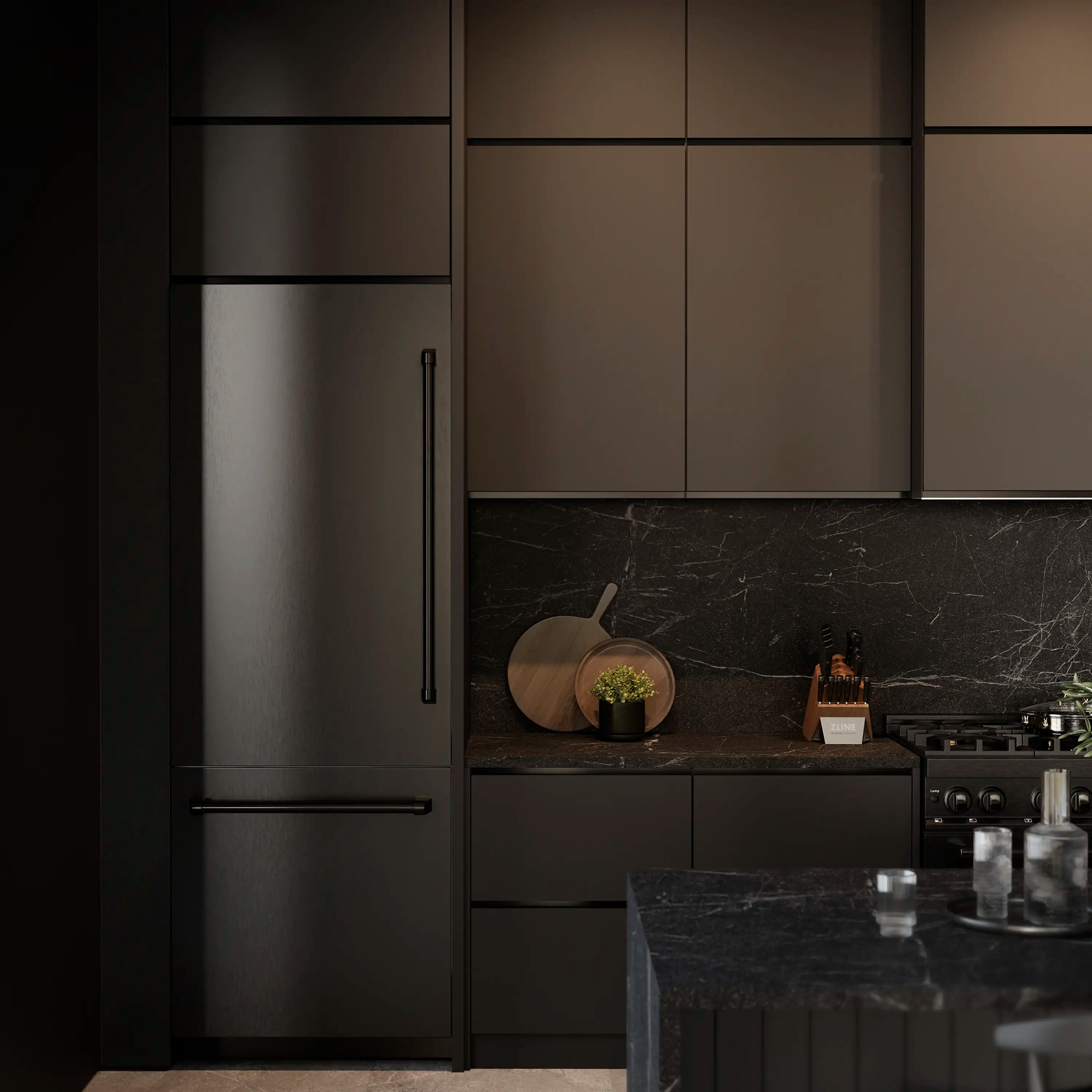 Black stainless built-in bottom freezer refrigerator with tall handle doors