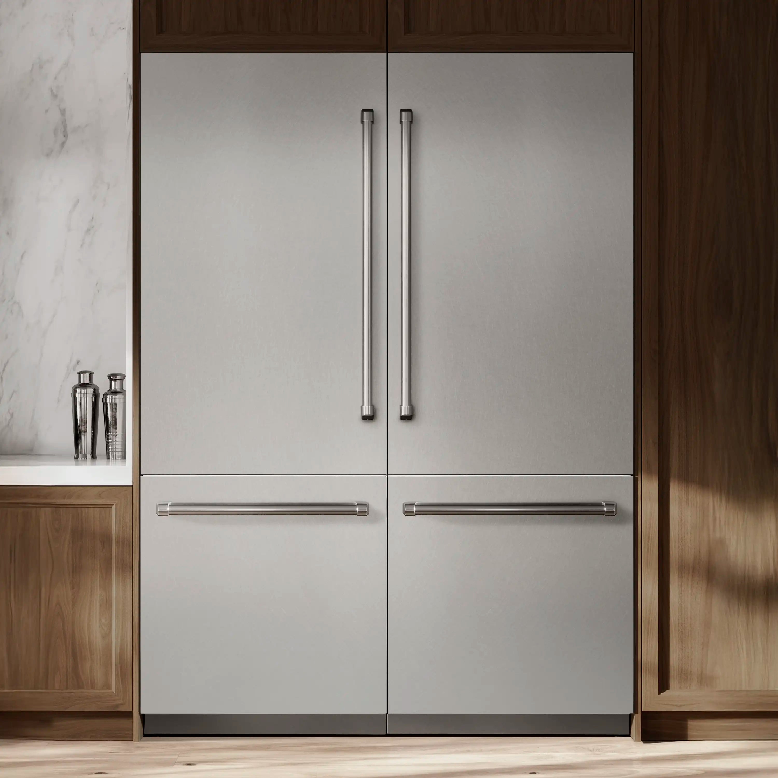 Built-in French door refrigerator in satin stainless steel with bar door handles.