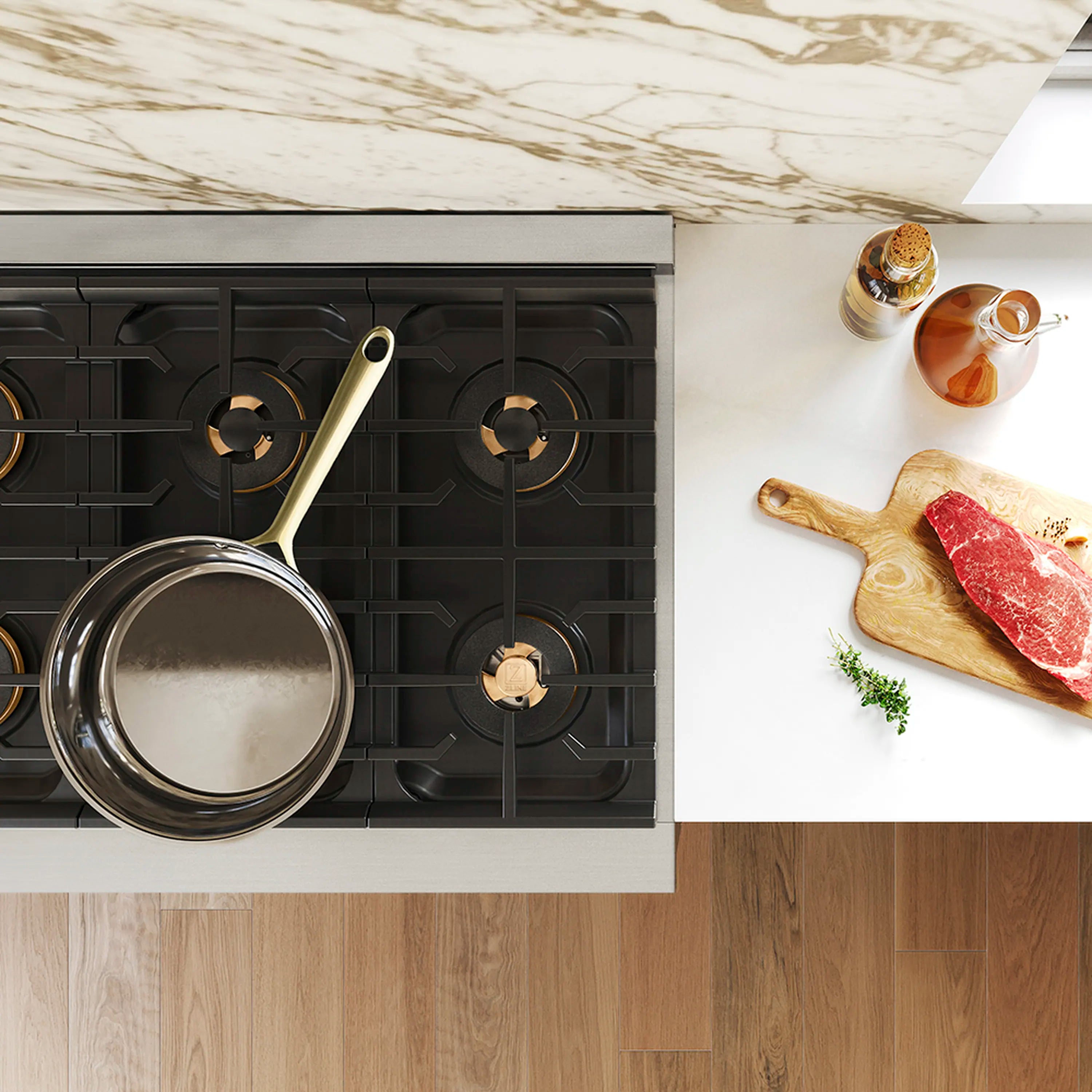 DUOPRO™ cooktop burners with black grates, pan, and pot near the stove