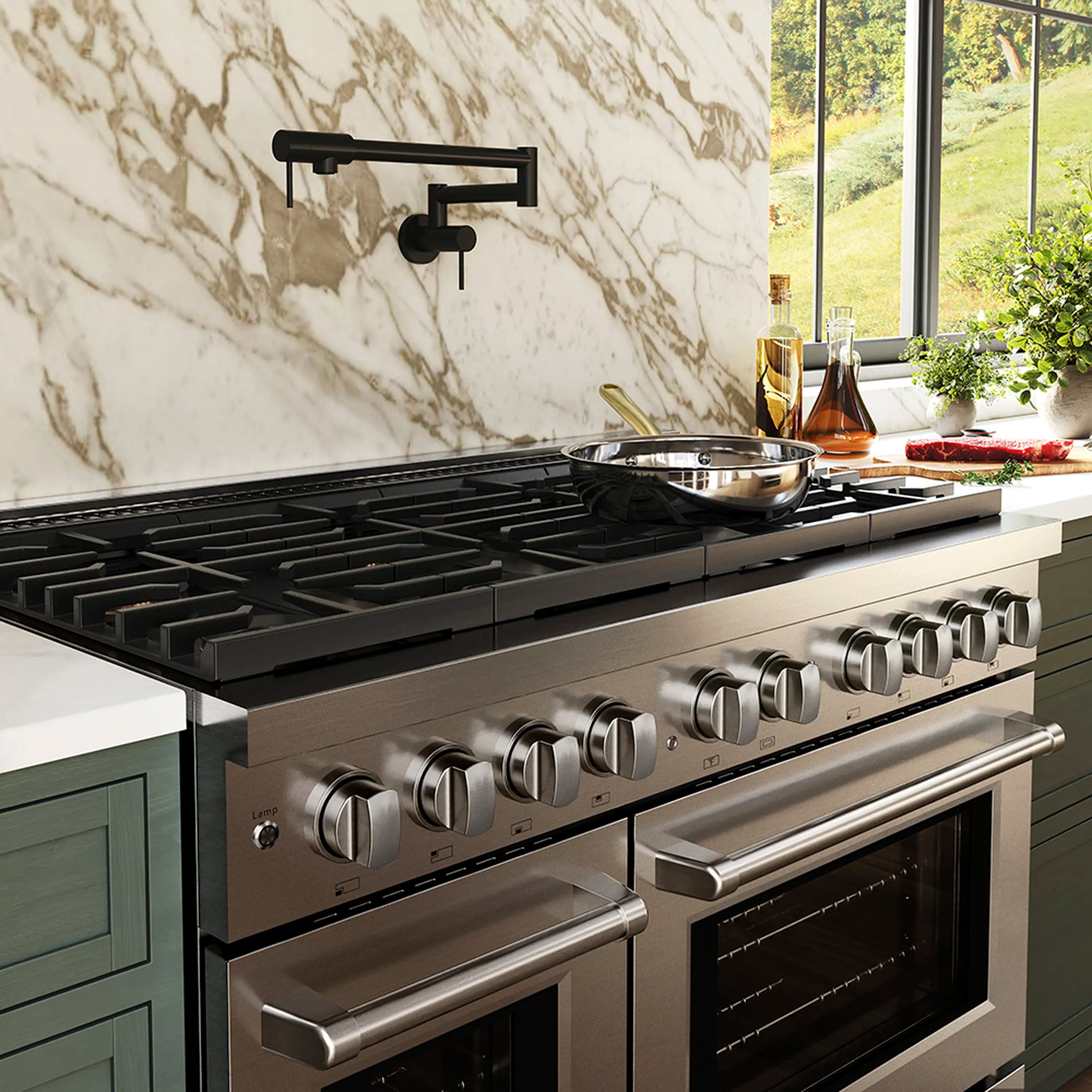 Dual-fuel range front view with black grates, skillet, and control knobs