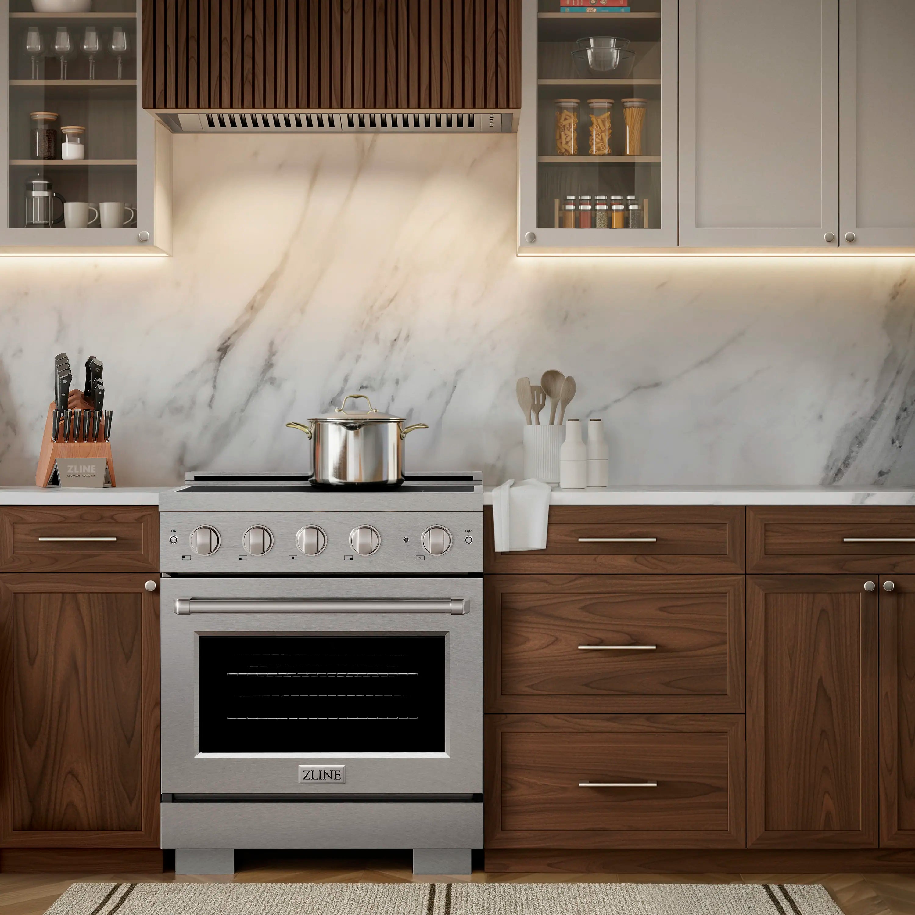 Stainless steel freestanding induction range with electric convection oven