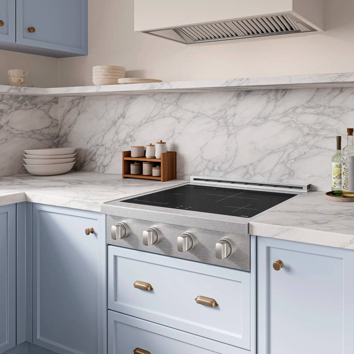 Stainless steel induction rangetop with black cooktop surface