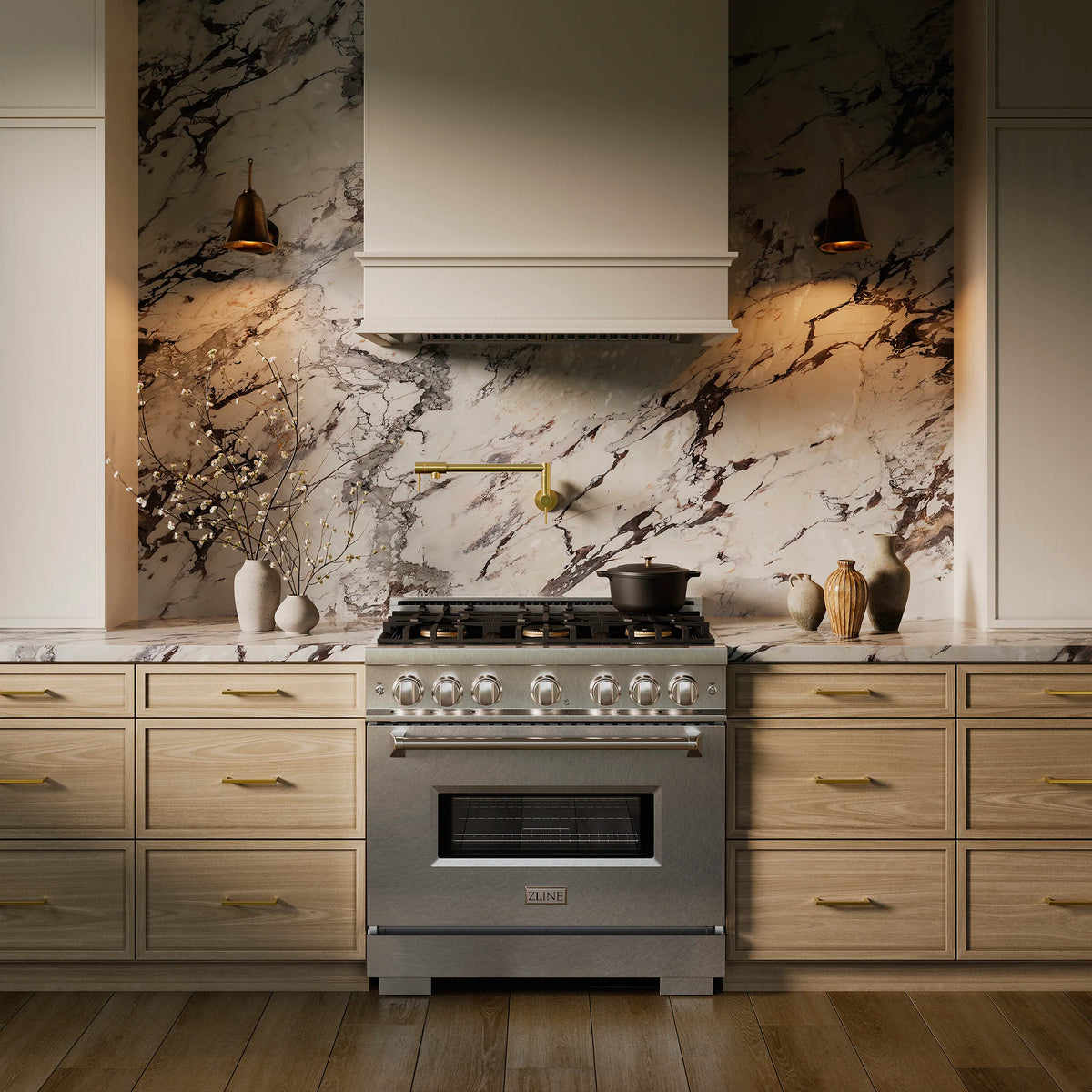 Satin stainless dual fuel range with oven door and cooktop burners in a kitchen