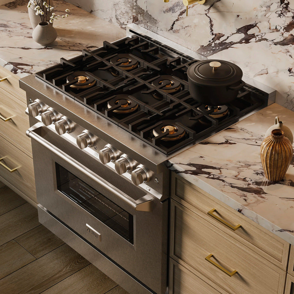 Dual fuel range cooktop with unlit burners and control knobs in satin stainless
