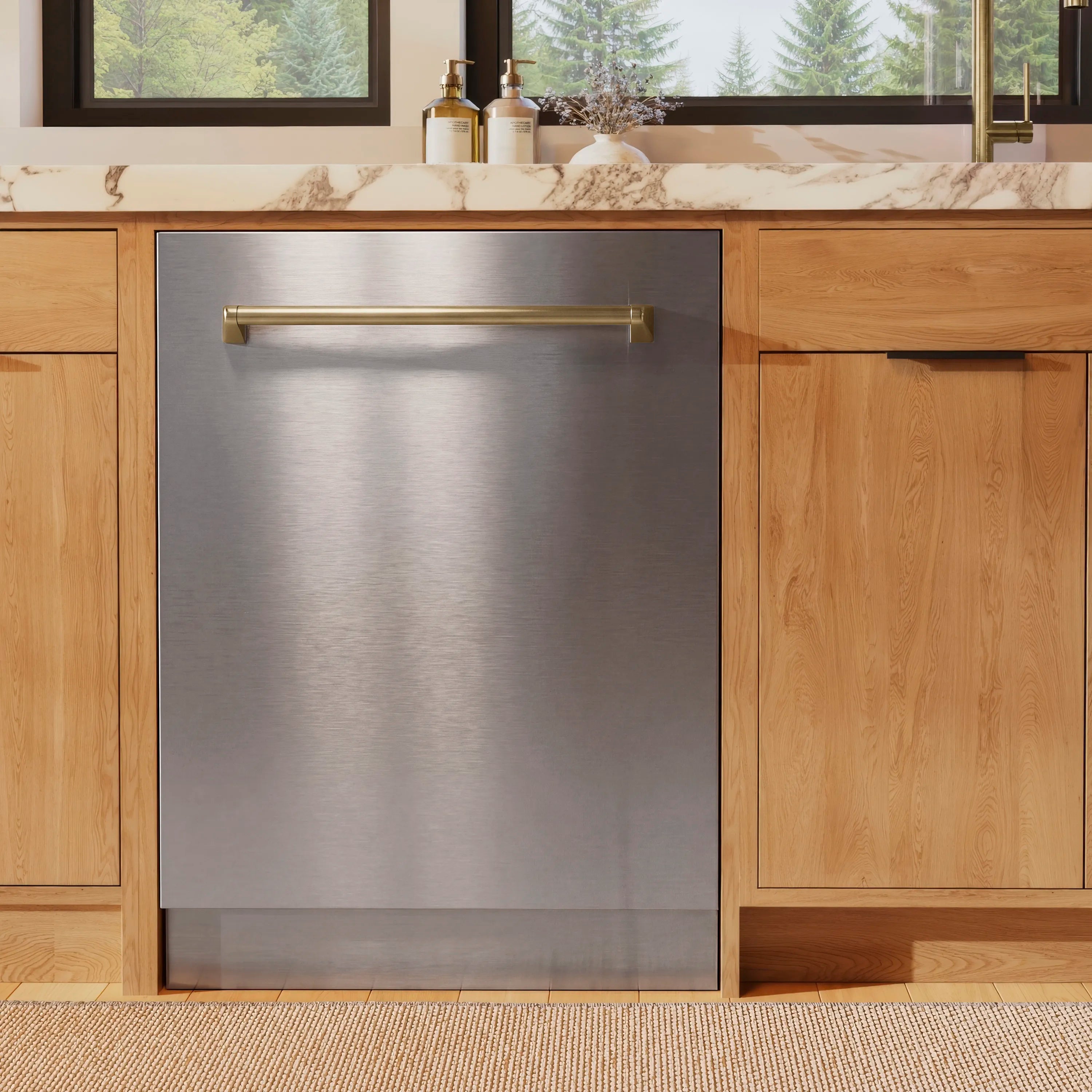 Stainless steel built-in dishwasher with champagne bronze bar handle, closed