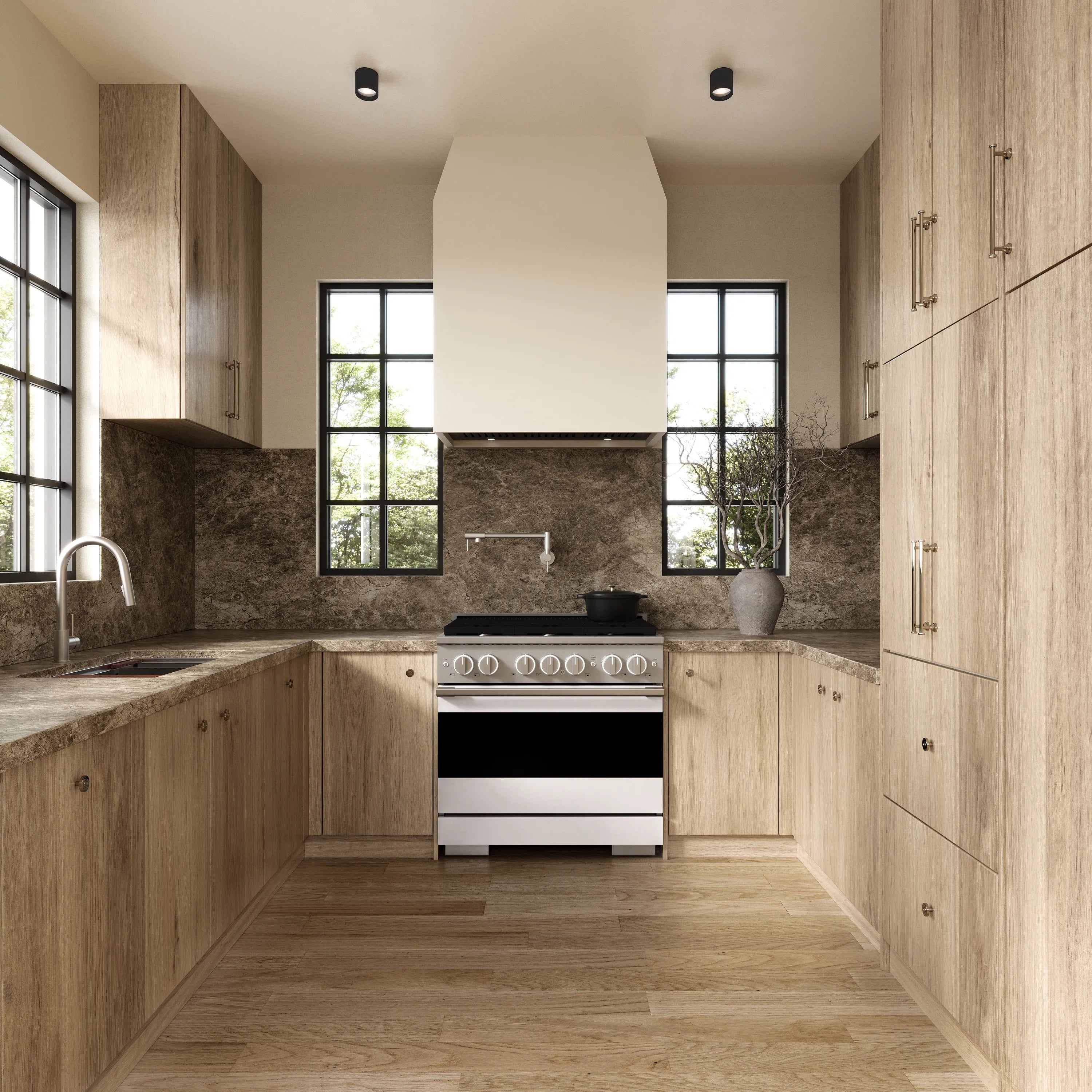 Stainless steel gas range built into light wood kitchen cabinetry