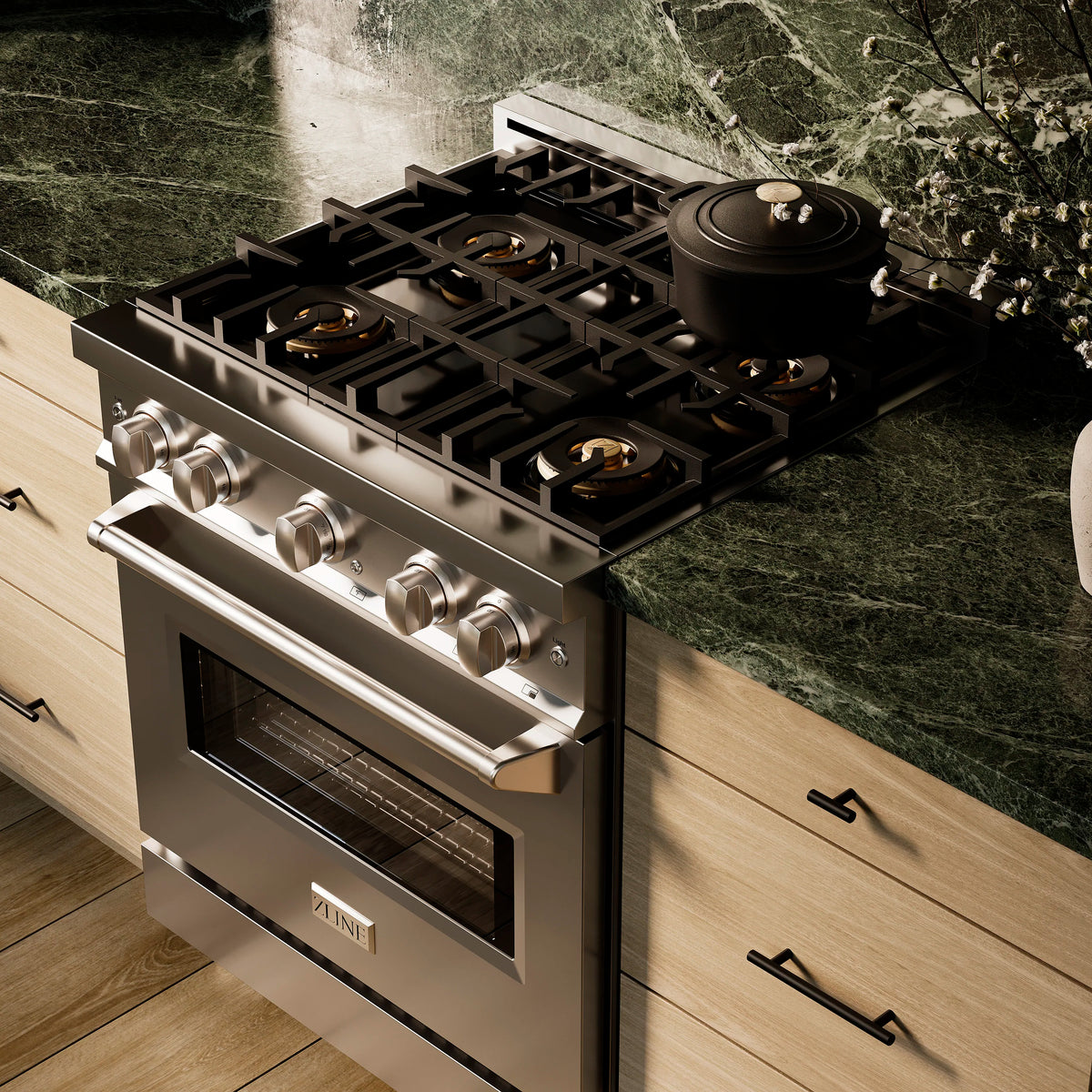 Stainless steel dual fuel range with four-burner cooktop and closed oven door