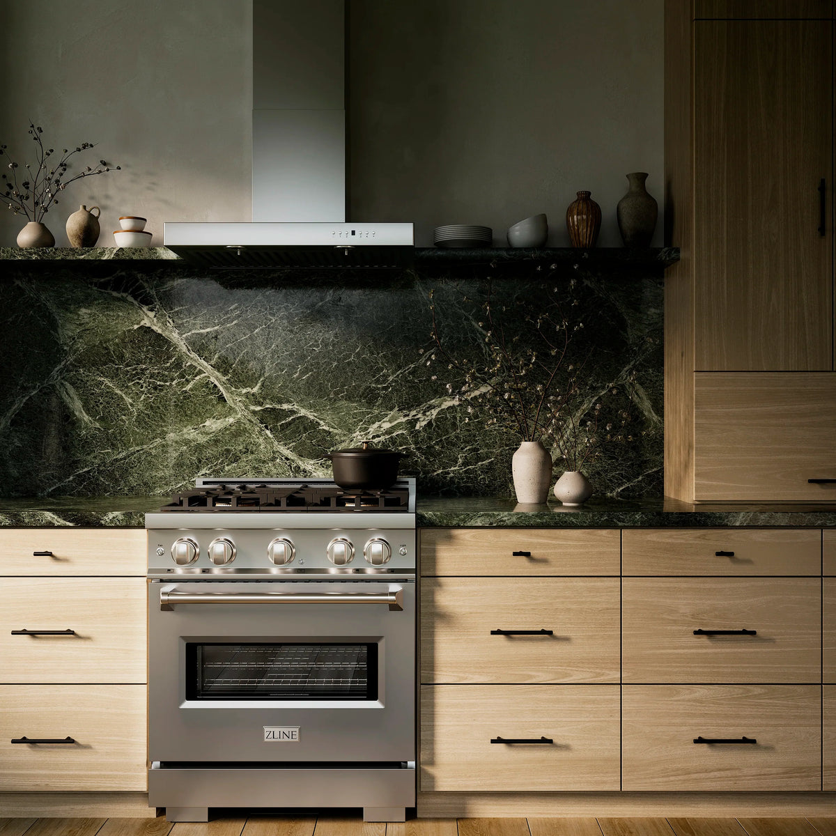 ZLINE stainless gas range with four burners and oven, centered in modern kitchen