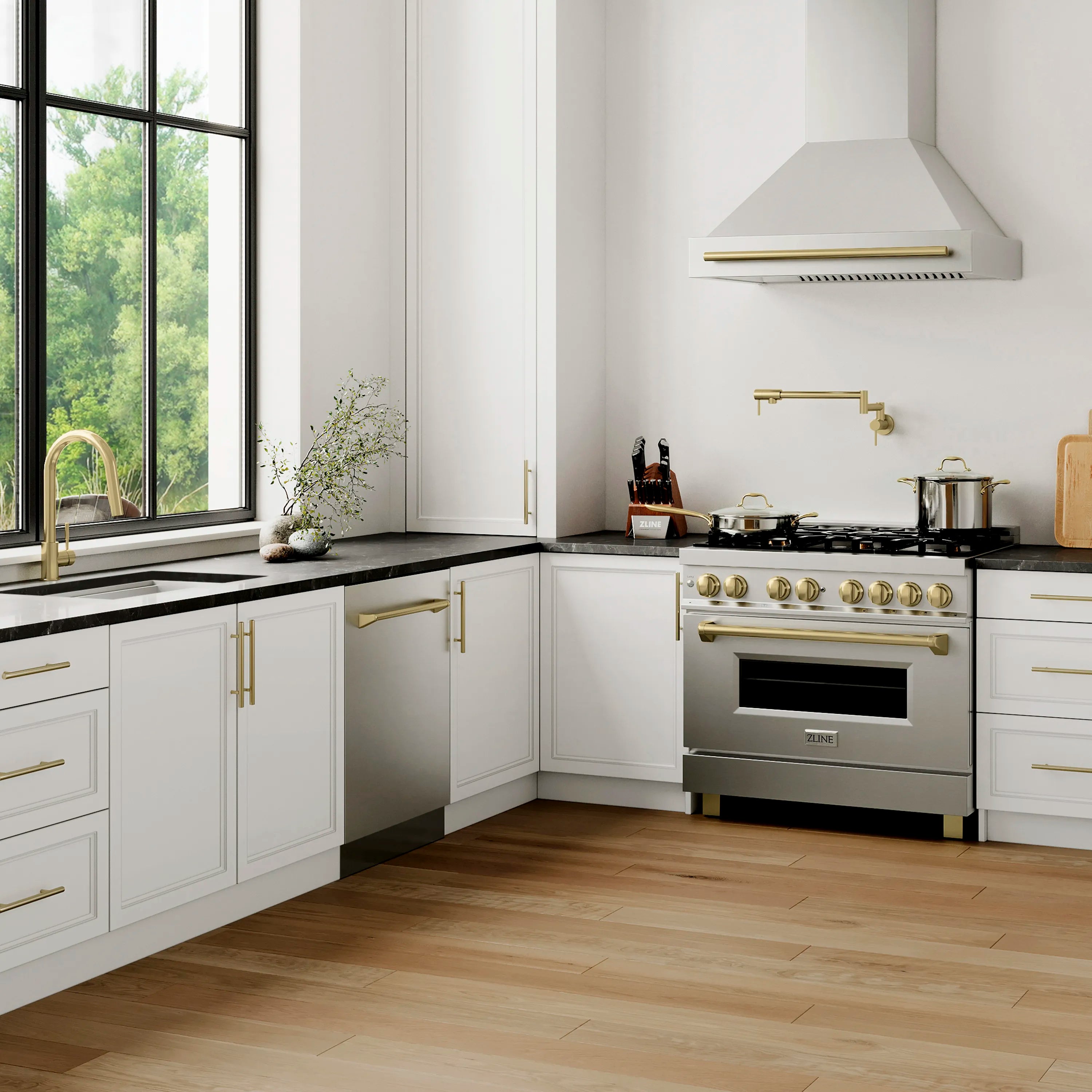 Built-in stainless dishwasher with champagne bronze bar handle, front view in kitchen