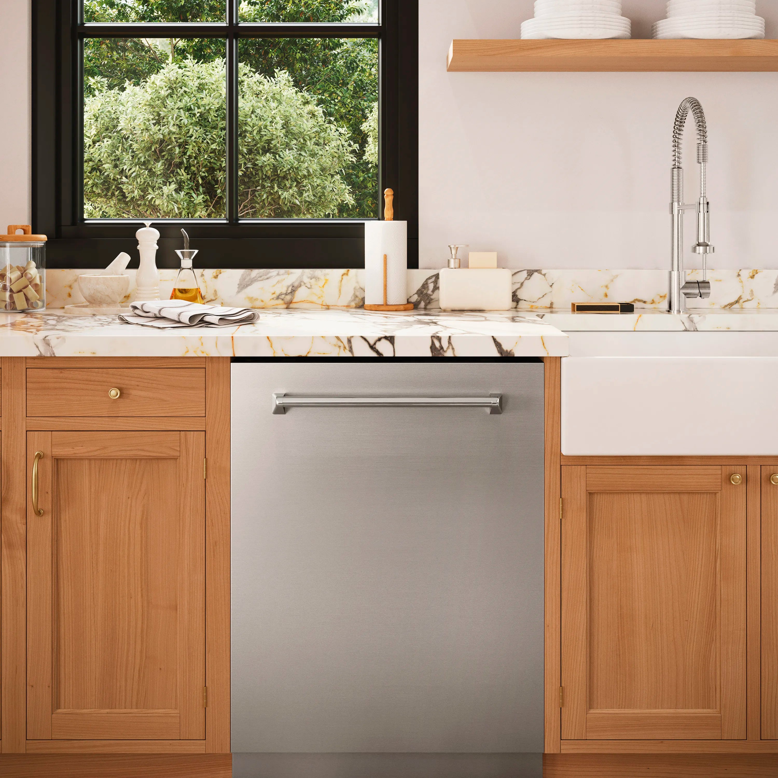 Built-in stainless steel dishwasher installed under a kitchen countertop