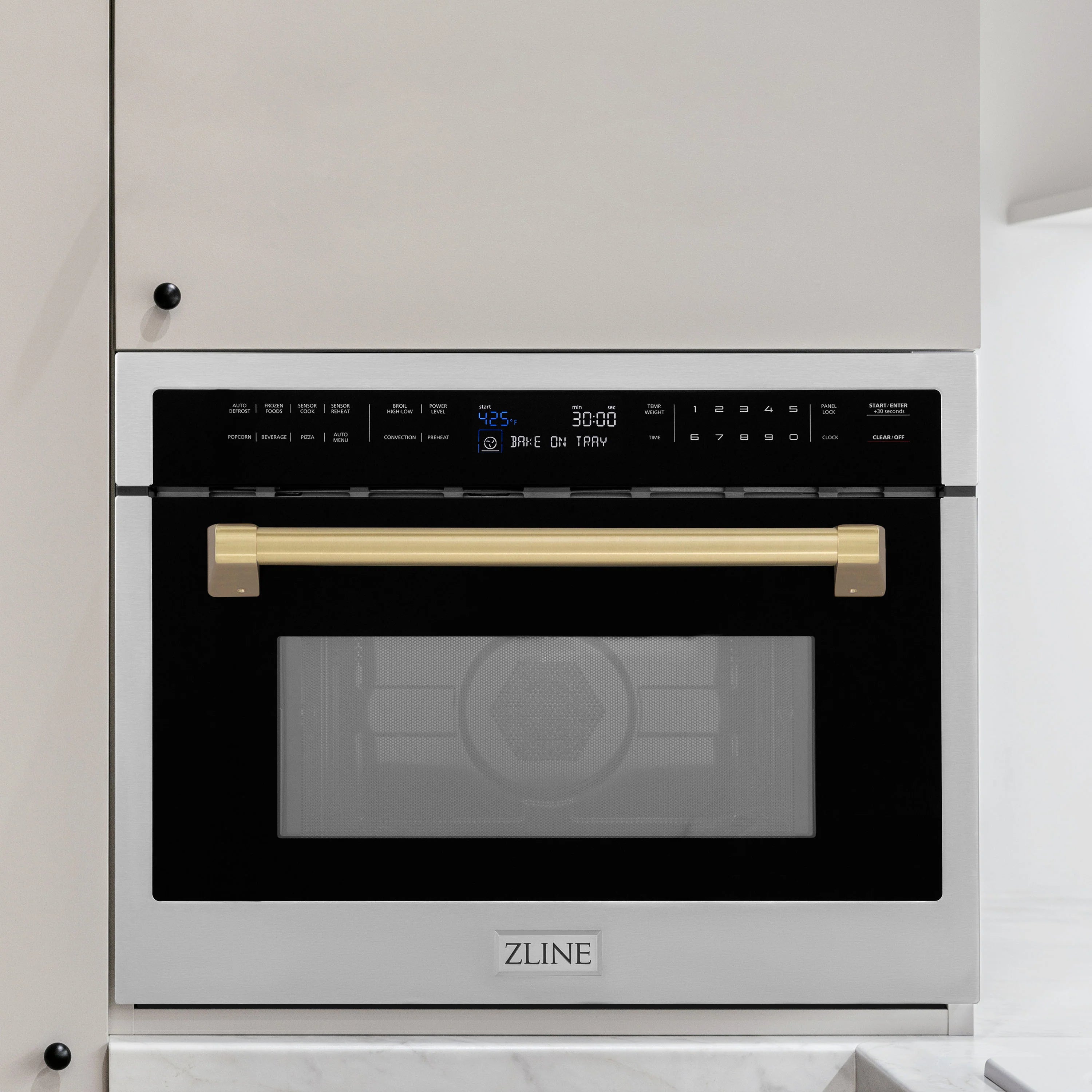 Built-in convection microwave oven control panel and open door window, stainless and bronze trim