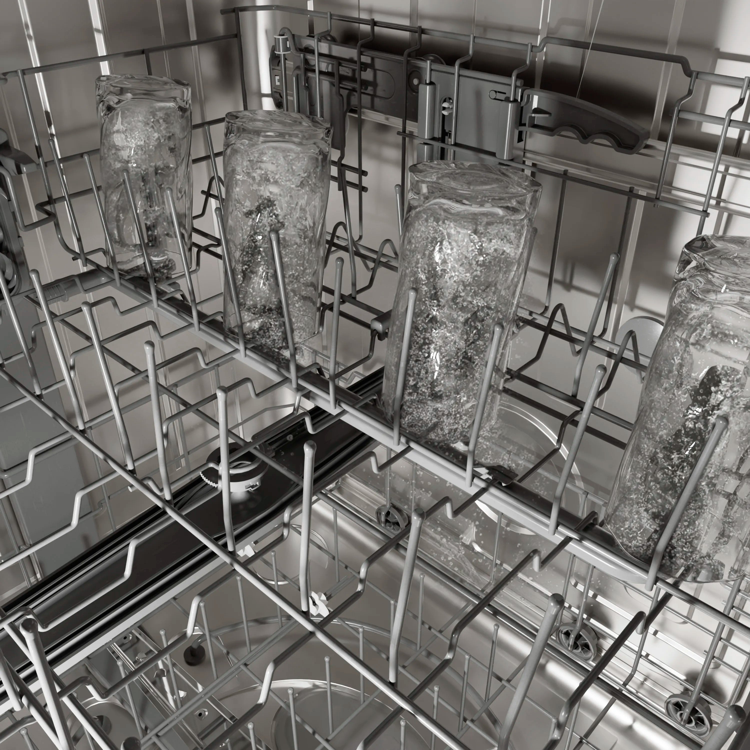 Dishwasher interior view with multiple racks holding tall glassware